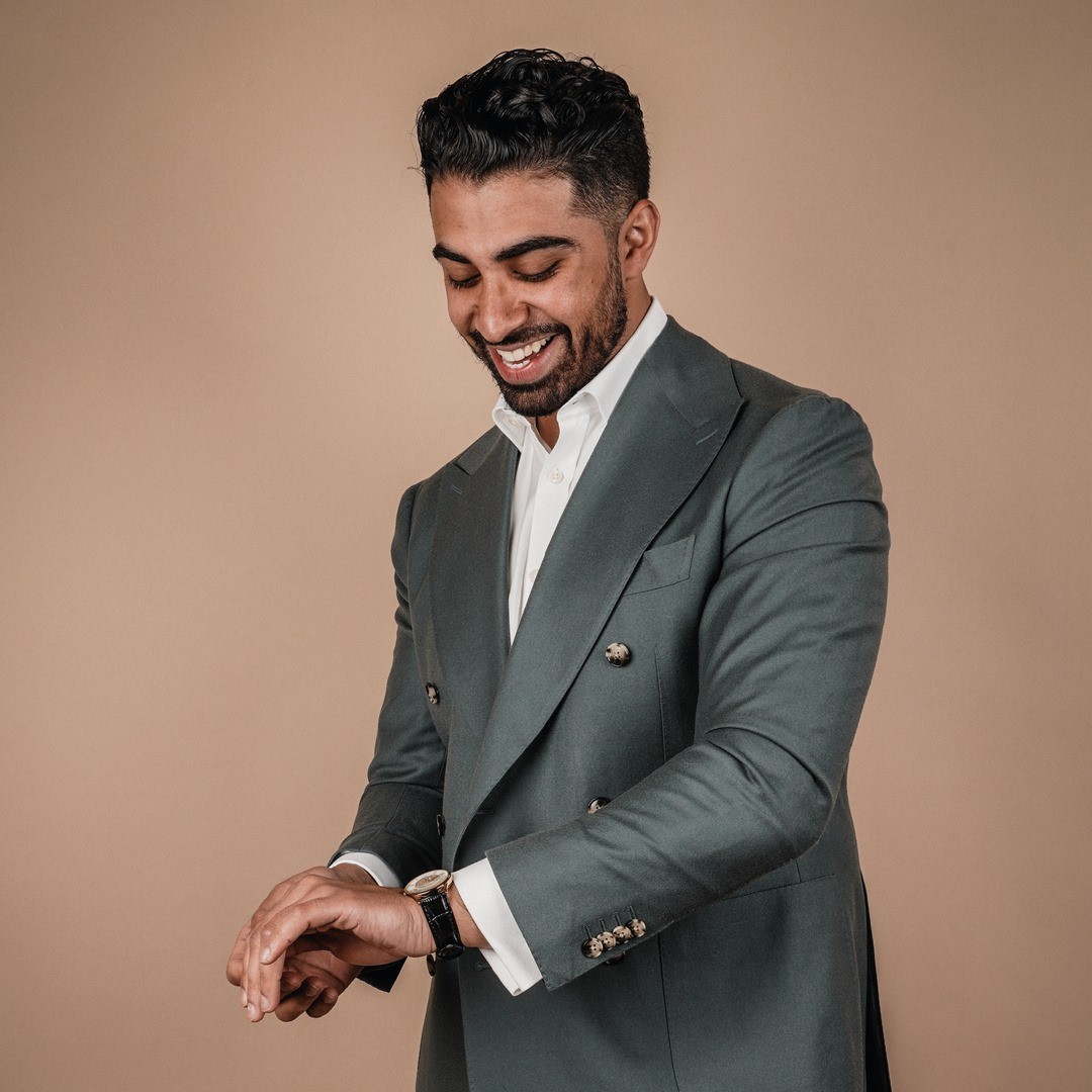 Man with blurred figure behind him