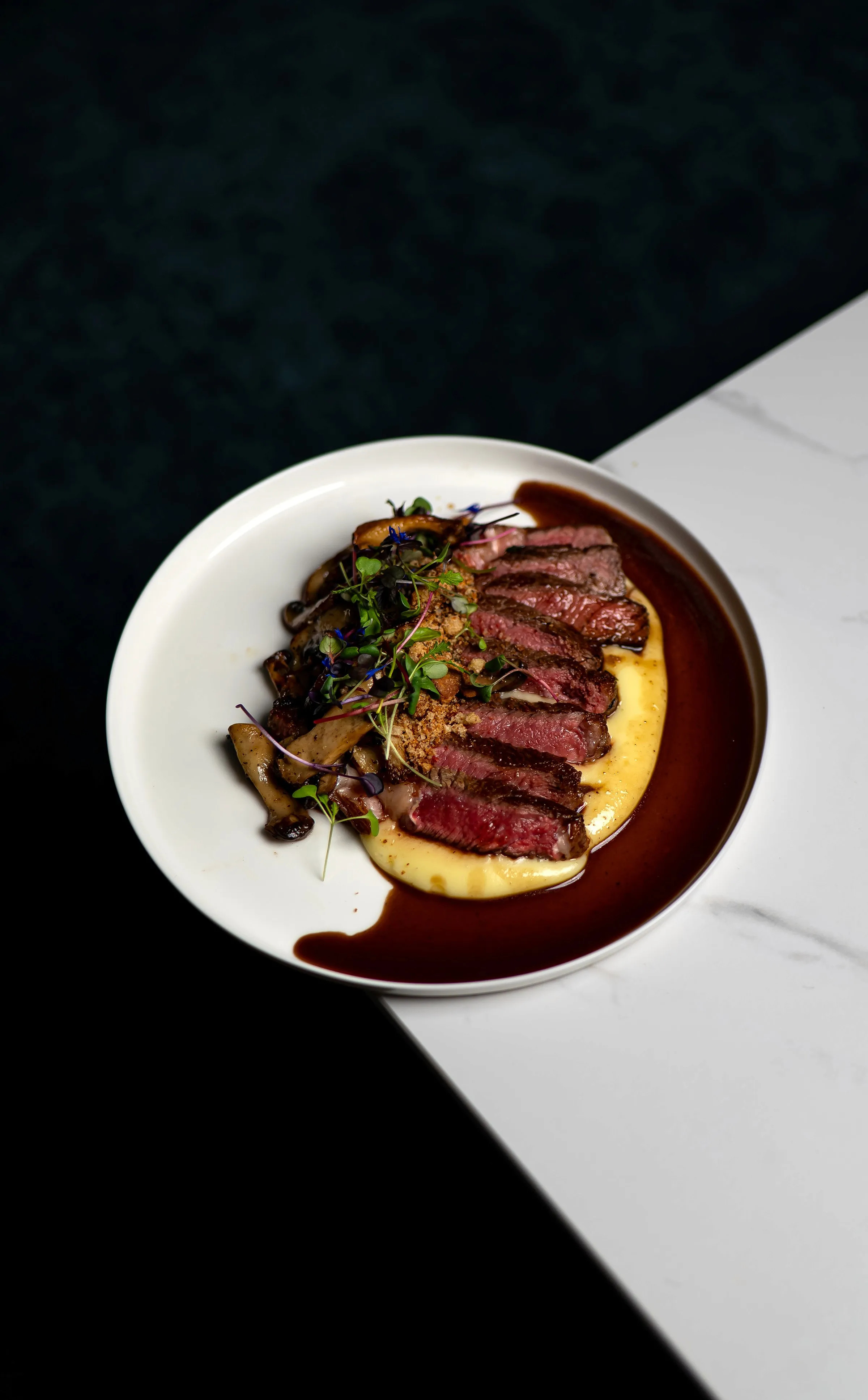 person writing on a piece of paper 