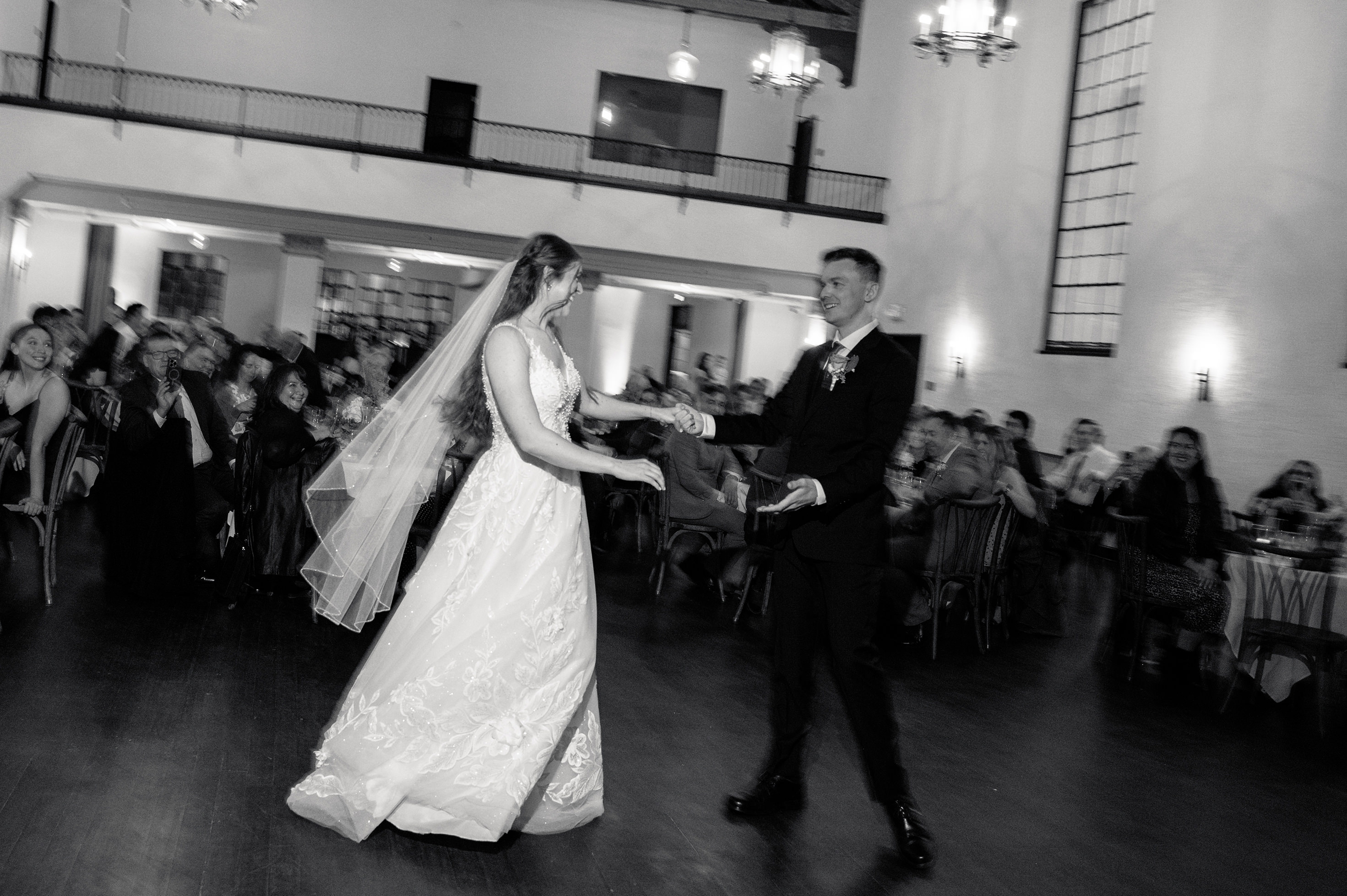 Flat lay wedding details with bouquet, rings, and sparkling bridal heels