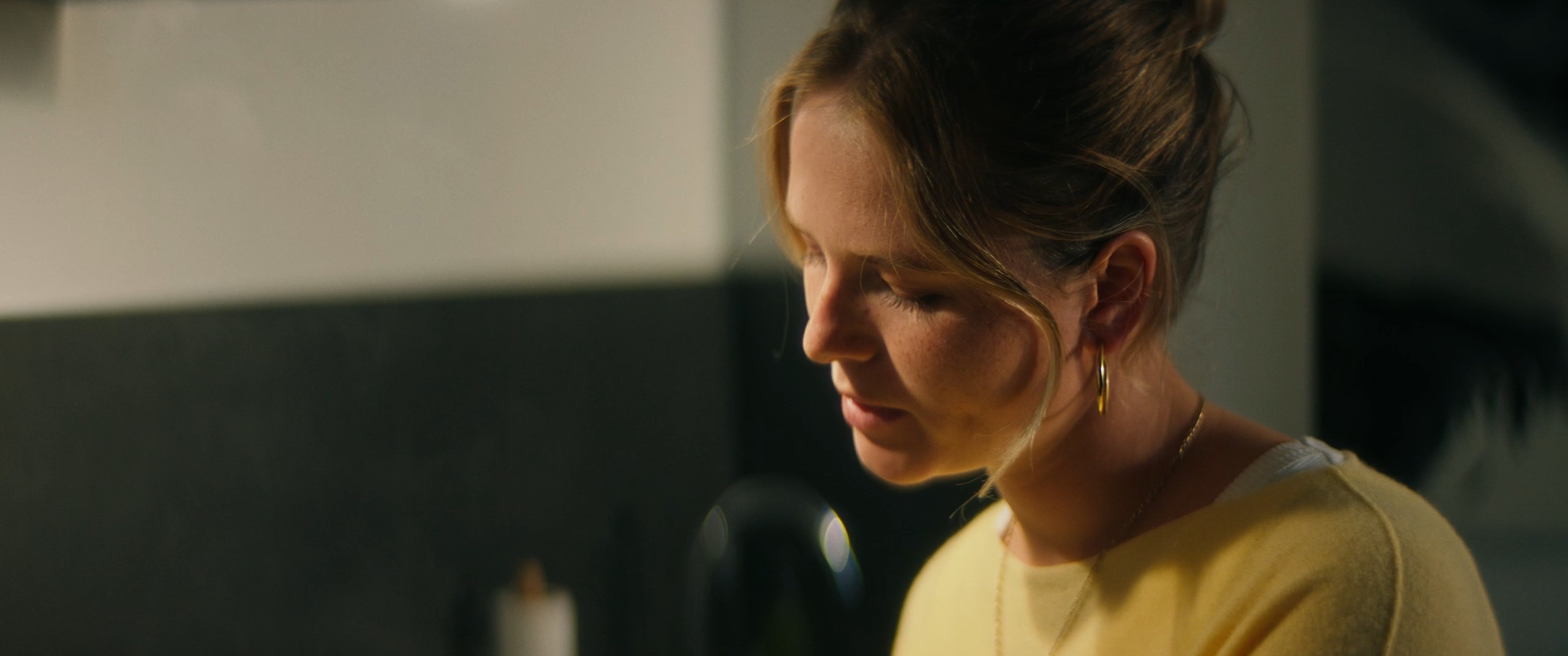 a woman in a kitchen