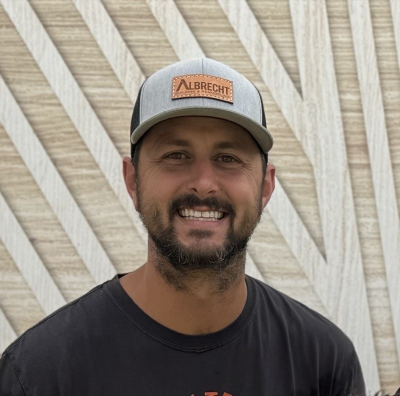 man using smartphone on chair