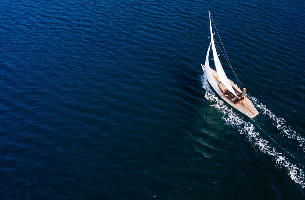 Red digital warning symbol glowing on a circuit board interface, representing active ransomware exploitation of the VMware ESXi CVE 2025 22225 vulnerability and hypervisor compromise.