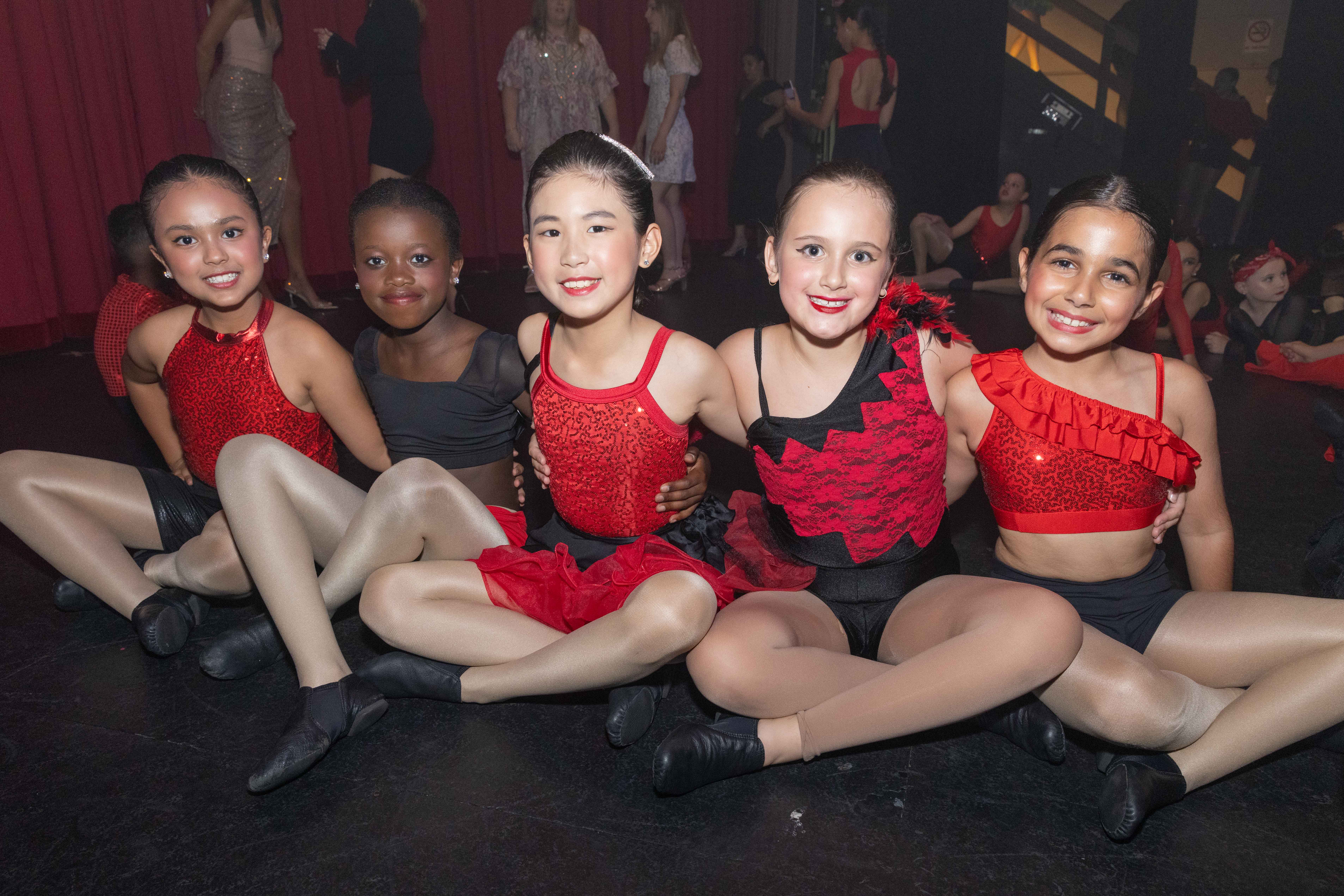 Students preparing backstage