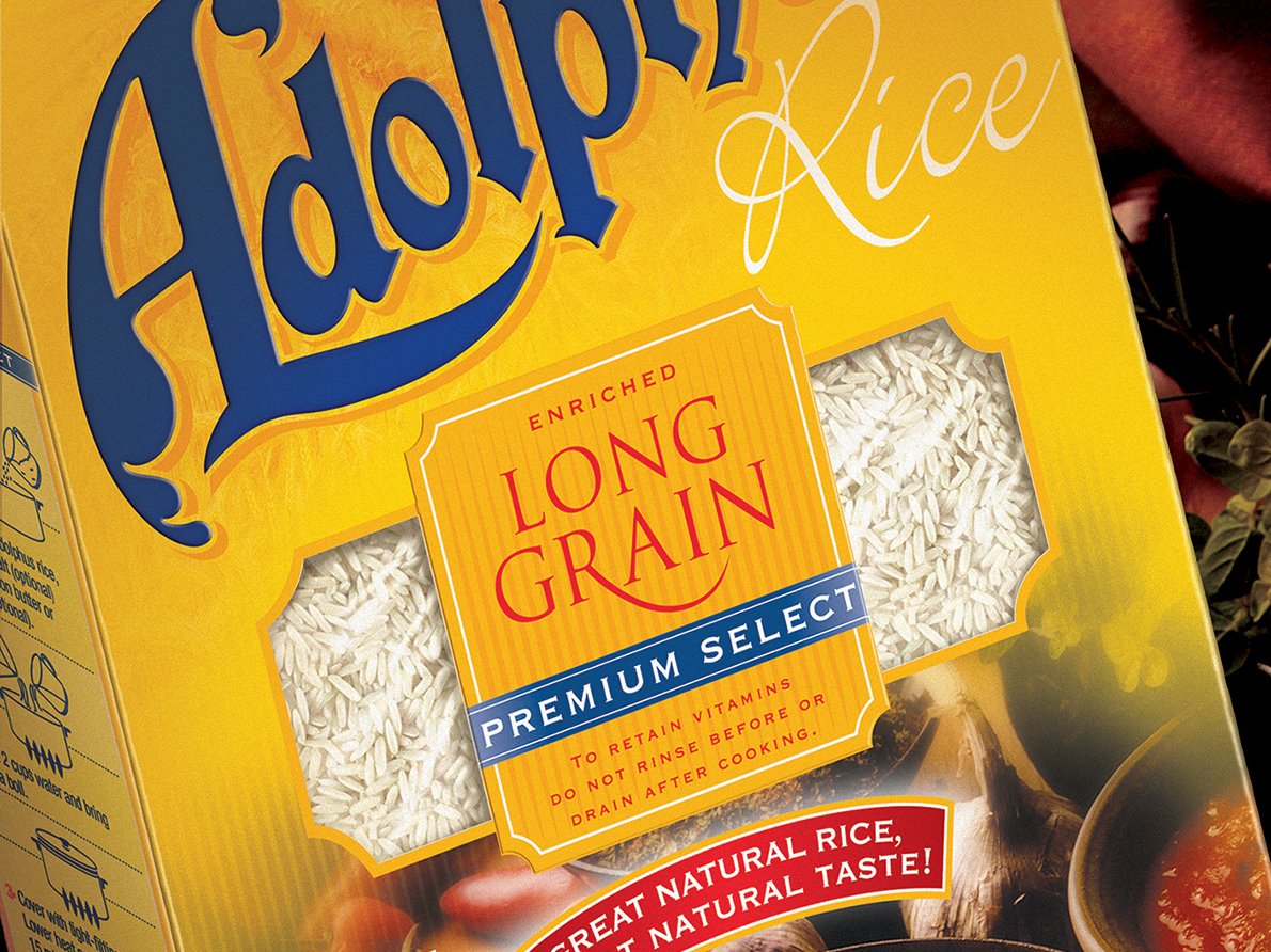 Rooftops of a coastal town with the sea in background