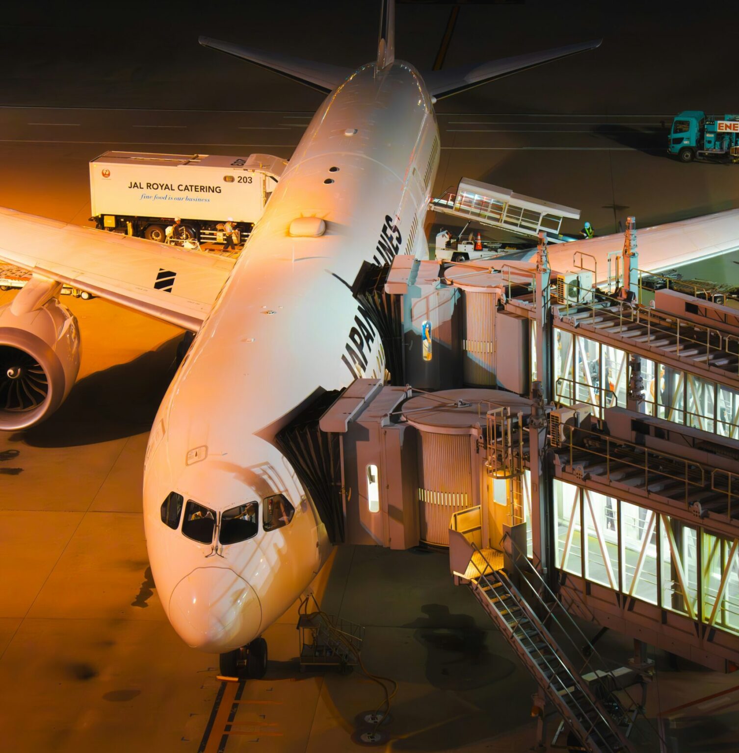 Airplane being boarded and serviced at airport