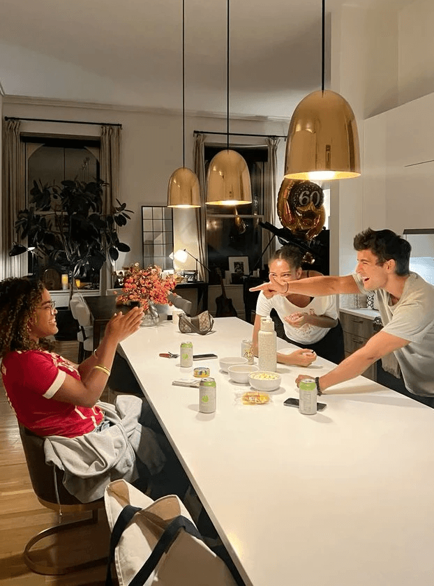 sitting woman in bed eating pastry