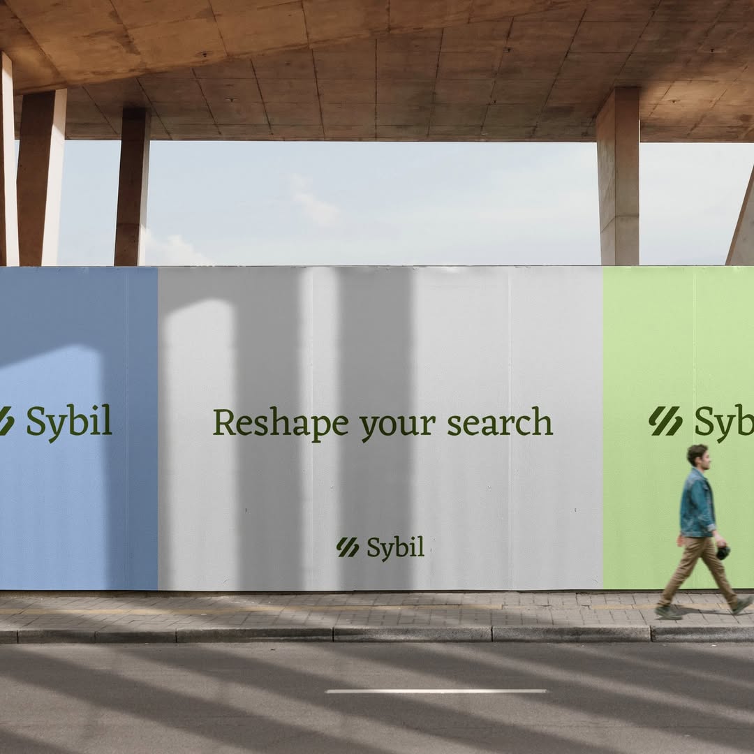 a japanese style building with a japanese roof and trees around it