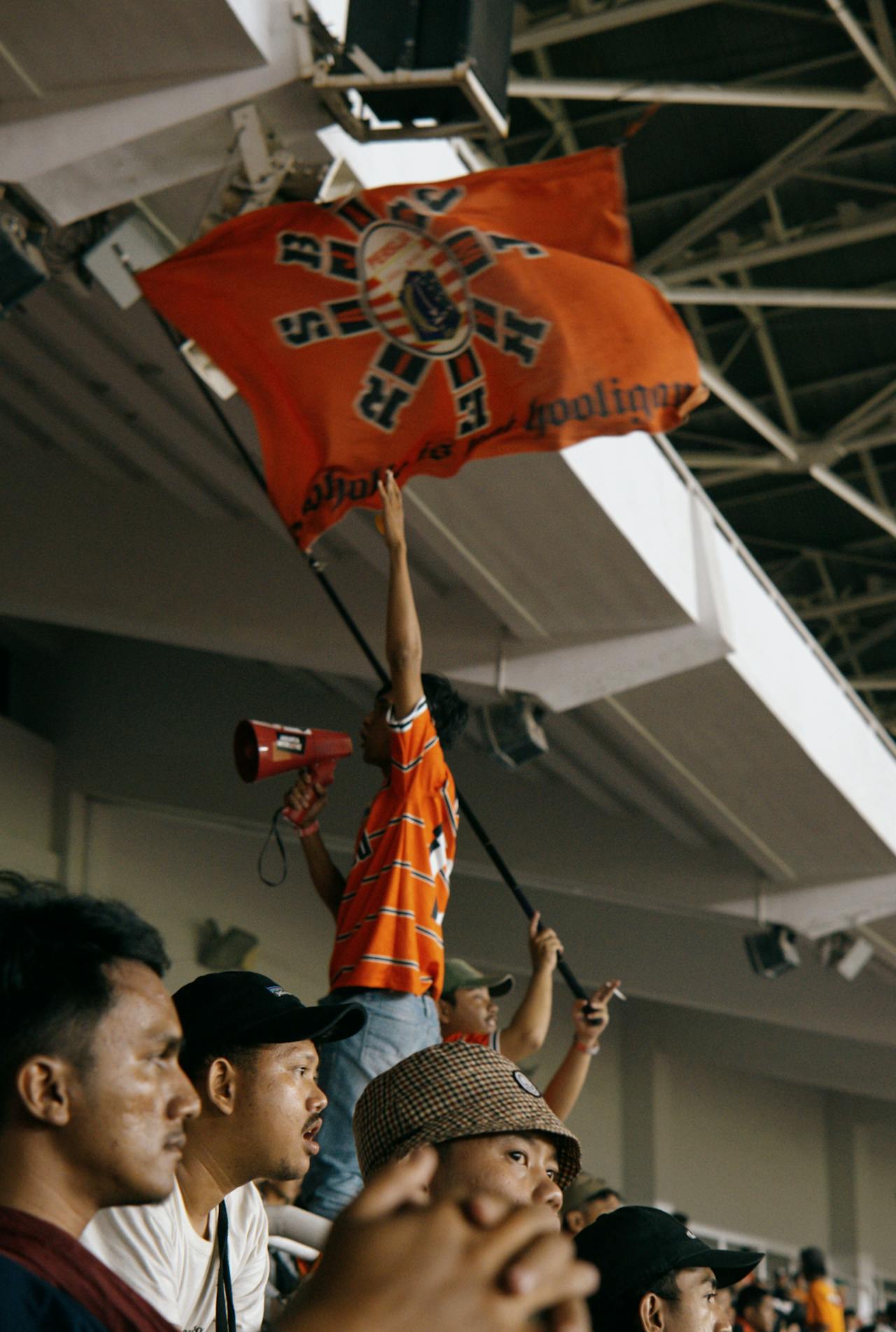 woman in blue hijab sitting on chair