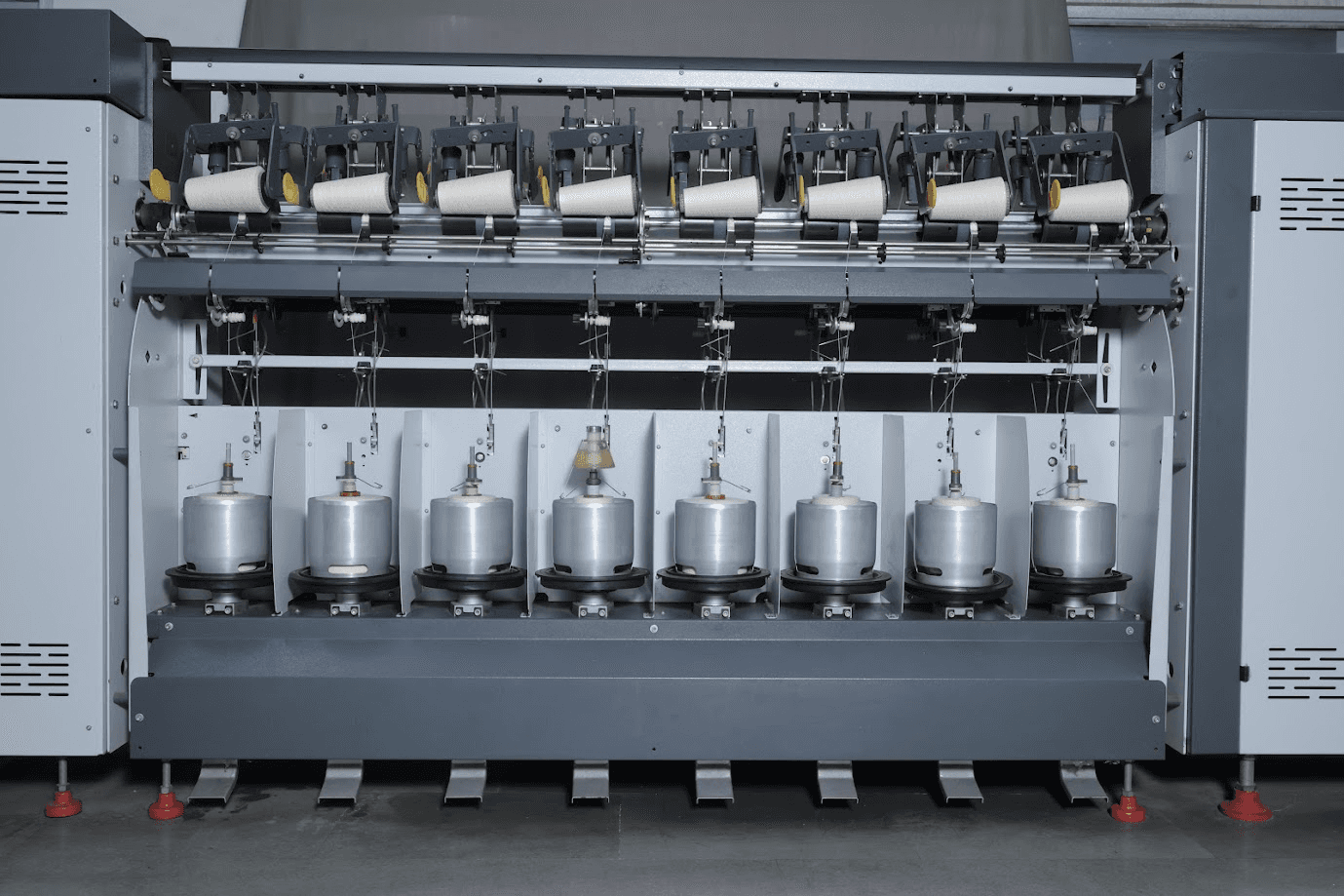 The MEERA MST Series TFO Twister for High-Performance Knitting, Sewing, and Weaving Yarn Production.