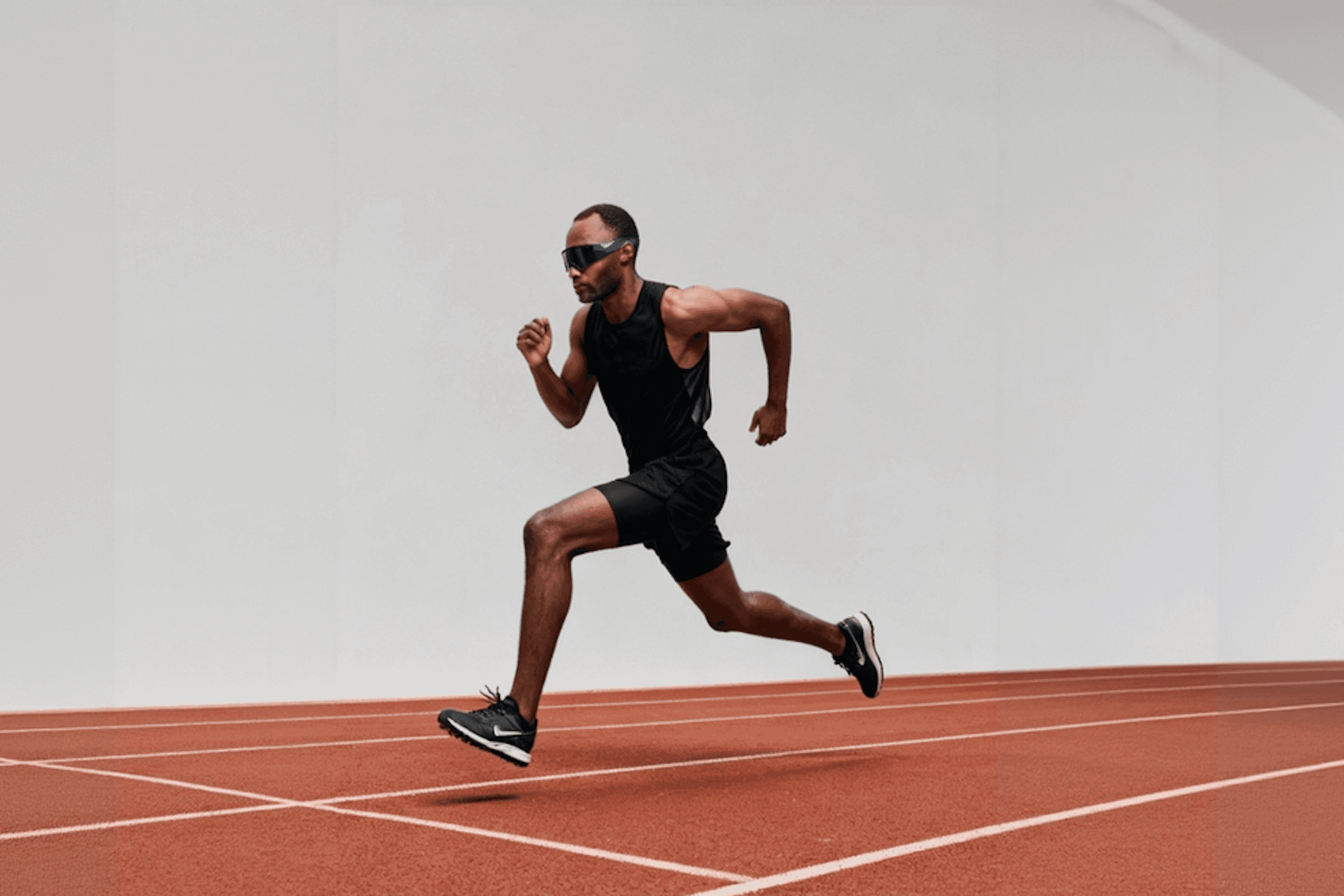 Athlete running on track wearing sportswear for peak performance lifestyle branding