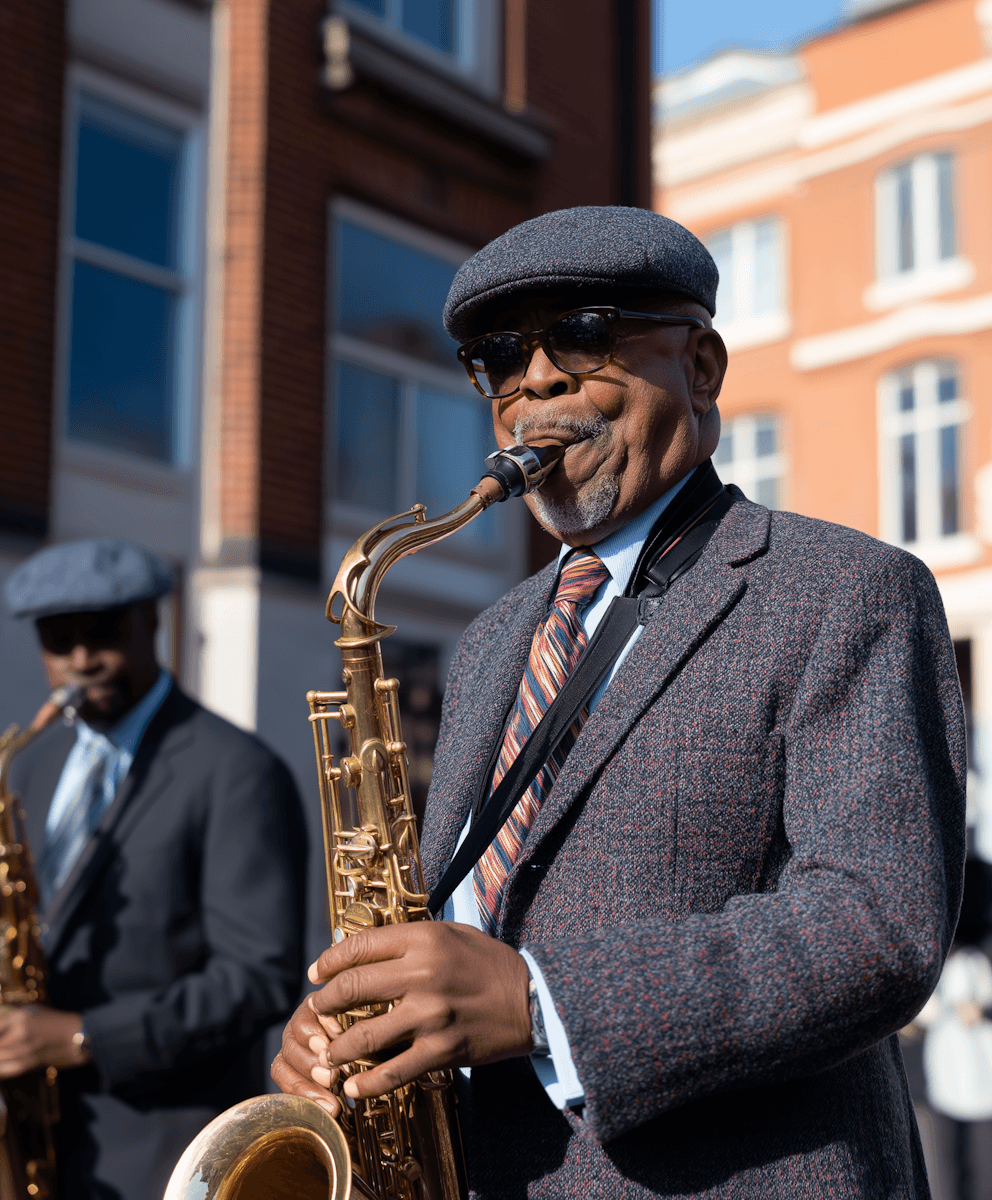 A man blowing a trumpet