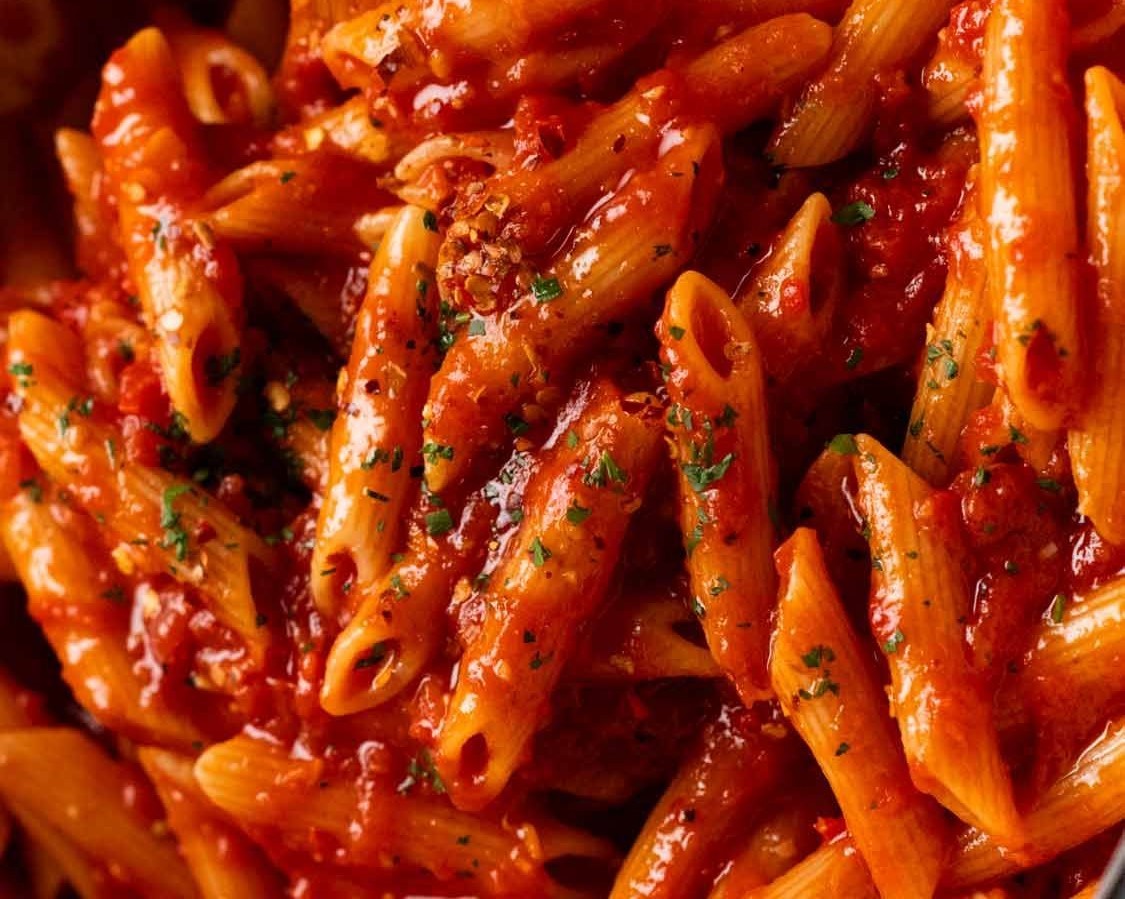 Butter Masala Penne from PASTA 9 Toronto, creamy tomato-butter pasta with herbs and fenugreek for Indo-Italian fusion comfort.