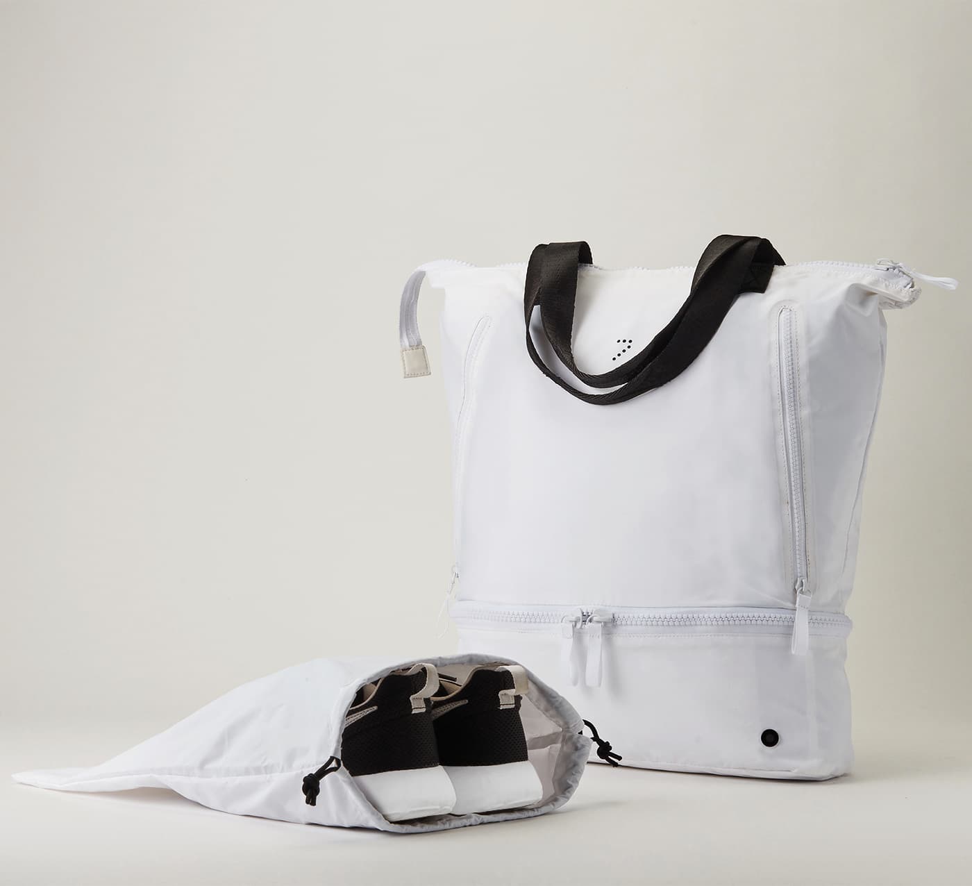 Streetside billboard with flyposters of the Batch.Works brand and illustrations