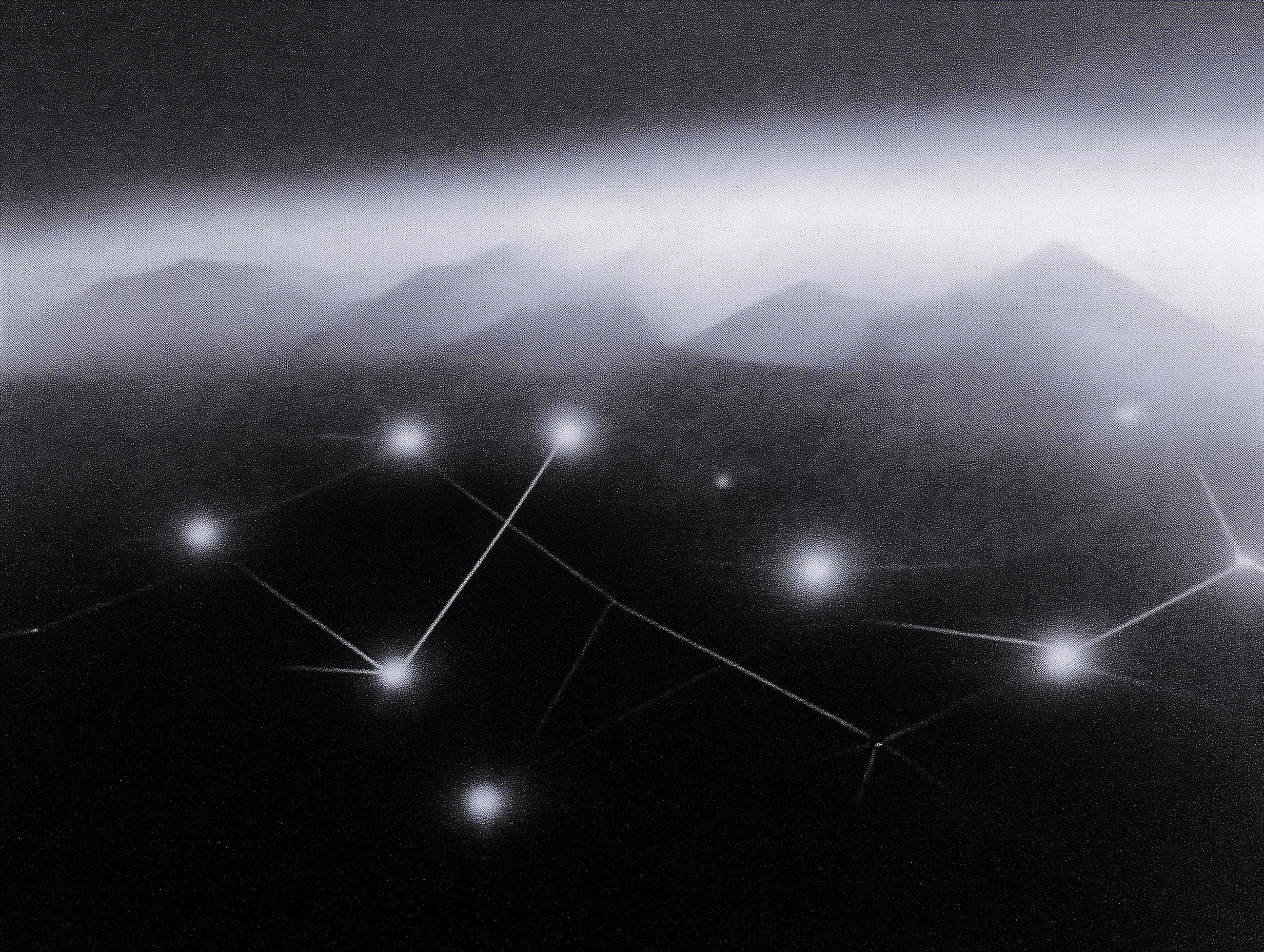 A 3D-rendered fuzzy black cat with large glowing orange eyes, a small pink nose, and a round orange charm on its chest, sitting against a soft peach background.