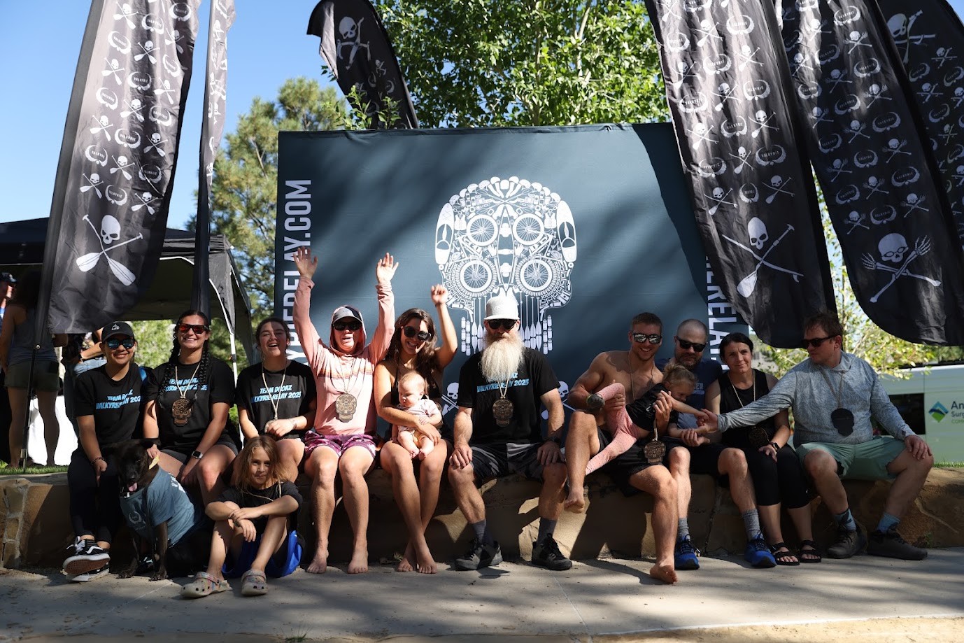 Teams and families at the Valkyrie backdrop
