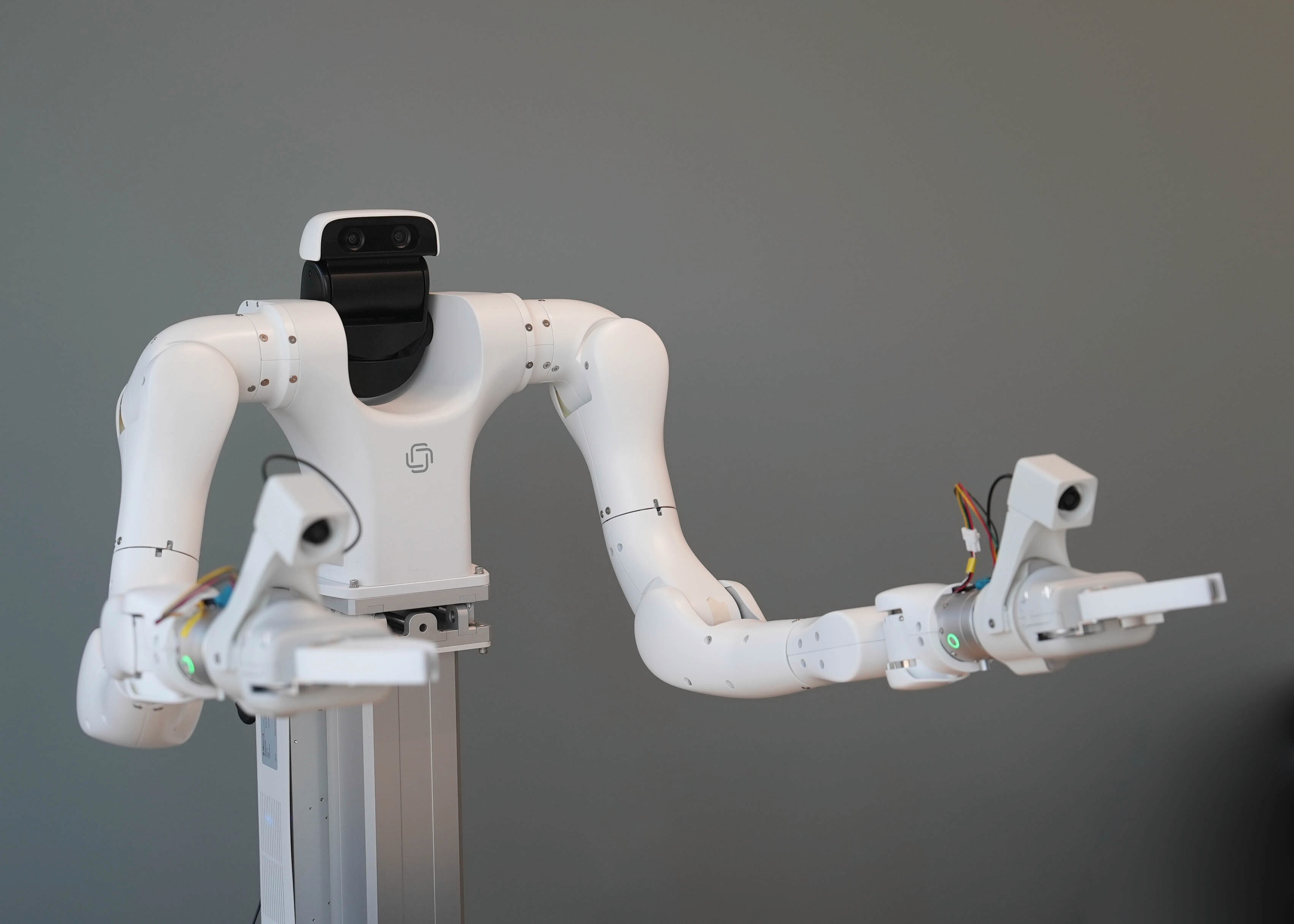 a light blue clock on a blue surface