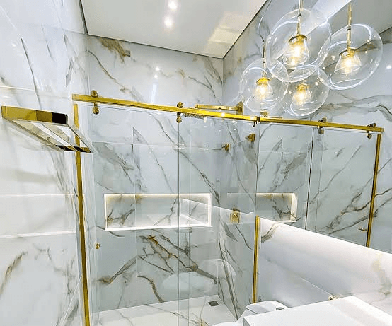 man wearing gray polo shirt beside dry-erase board