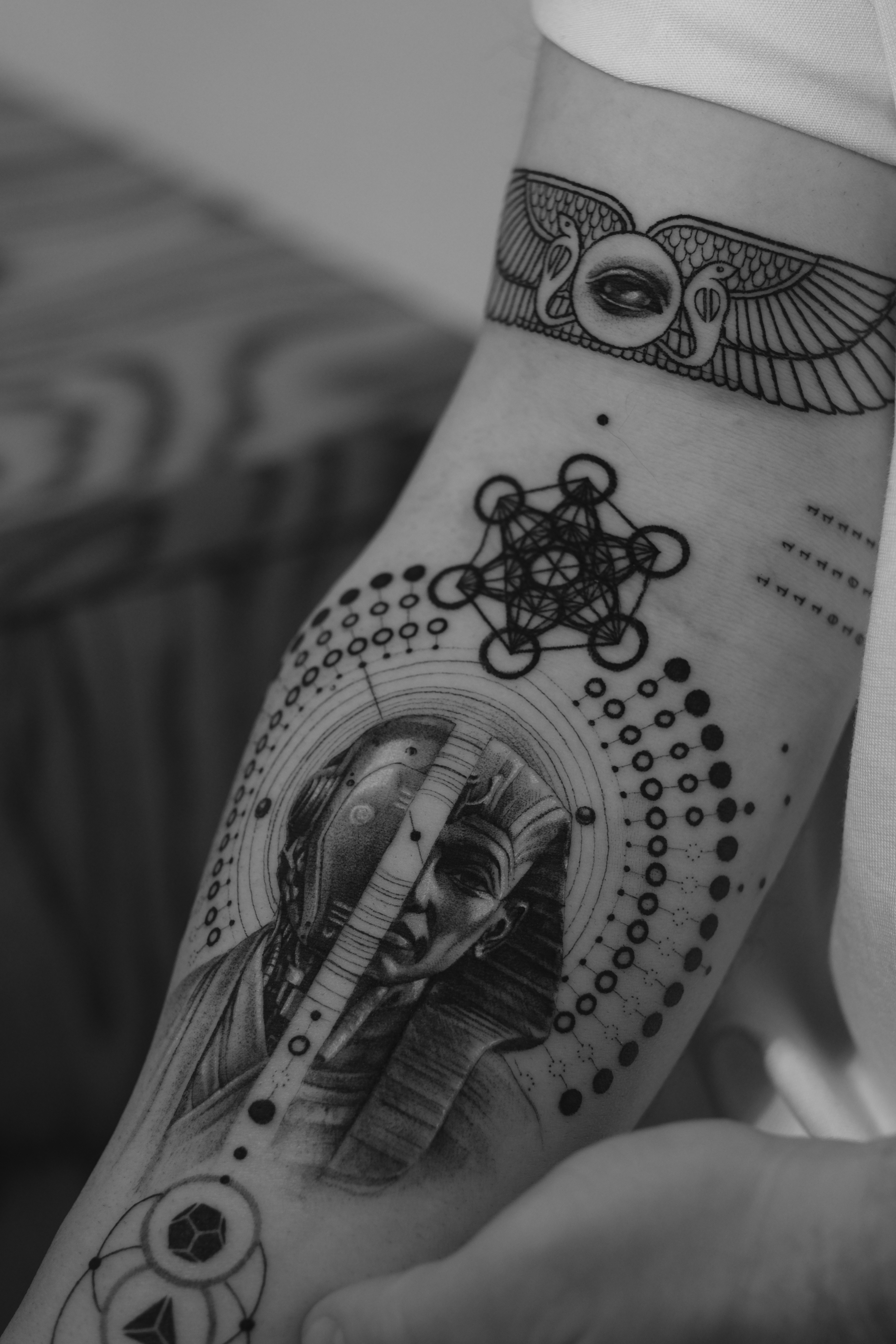 A serene countryside scene with farmers, cows, and lush greenery near a calm water stream