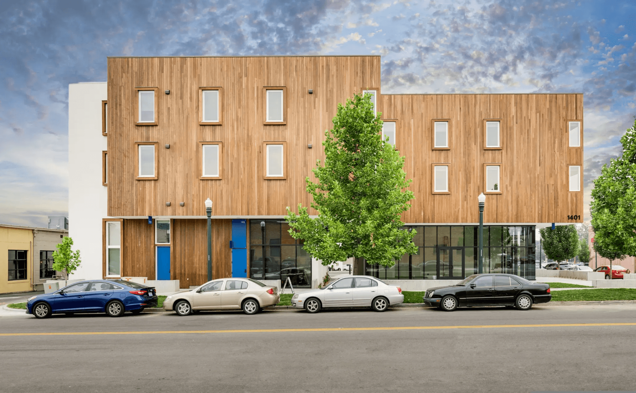 호실마다 인터넷과 TV 회선이 필요한 원룸·오피스텔 건물 외관으로, Biz 단체형 다회선 서비스가 유리한 주거시설 사업장 유형을 보여주는 이미지입니다.