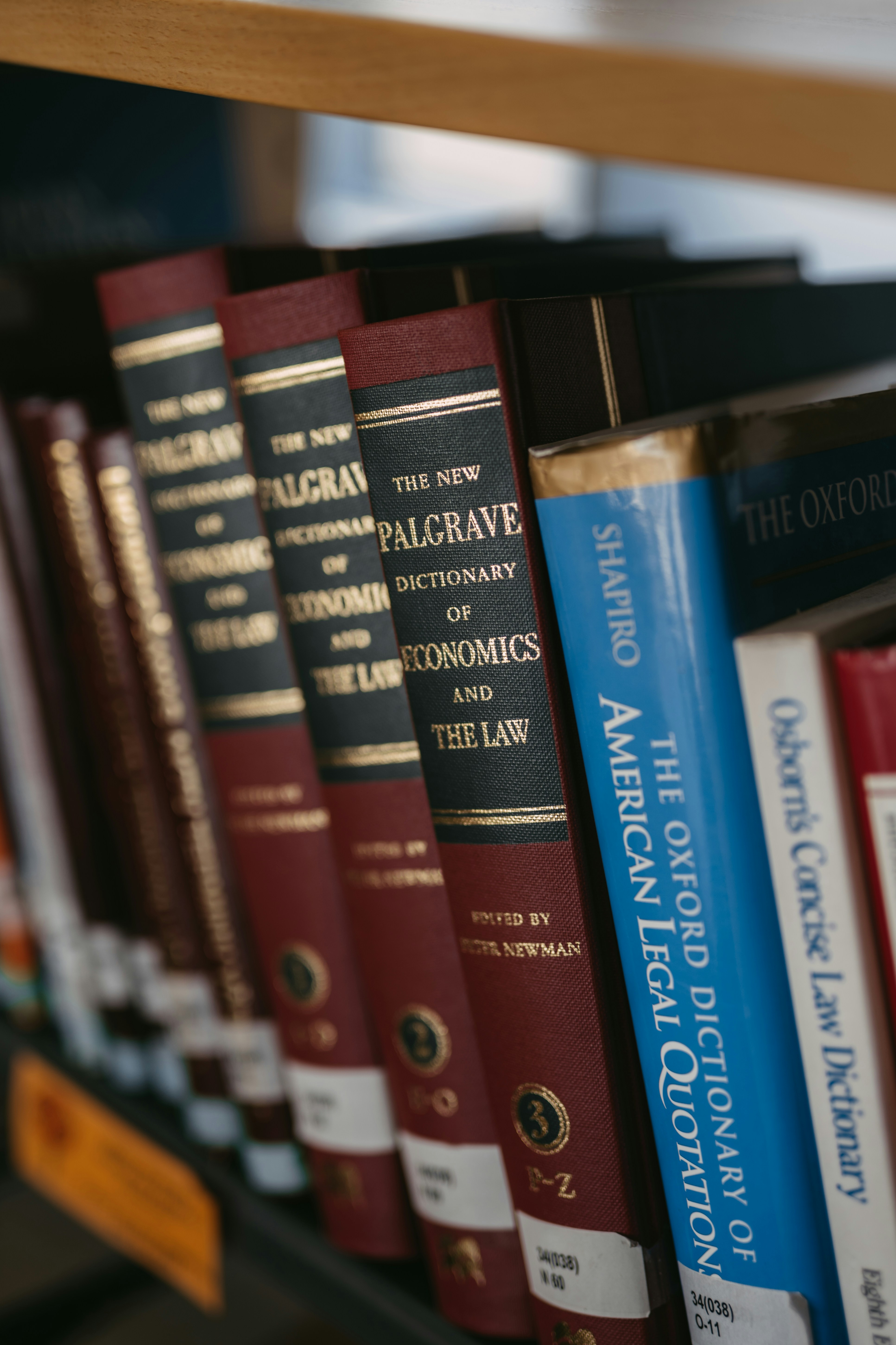 Books on a shelf in a library.