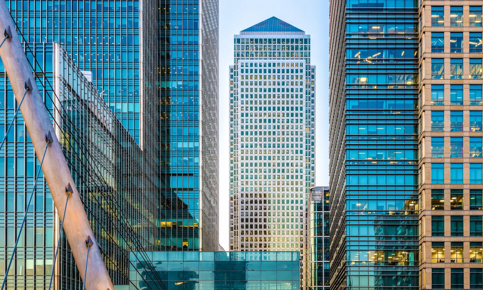 Modern Canary Wharf skyline in London showing financial district architecture associated with wealth structuring and international finance