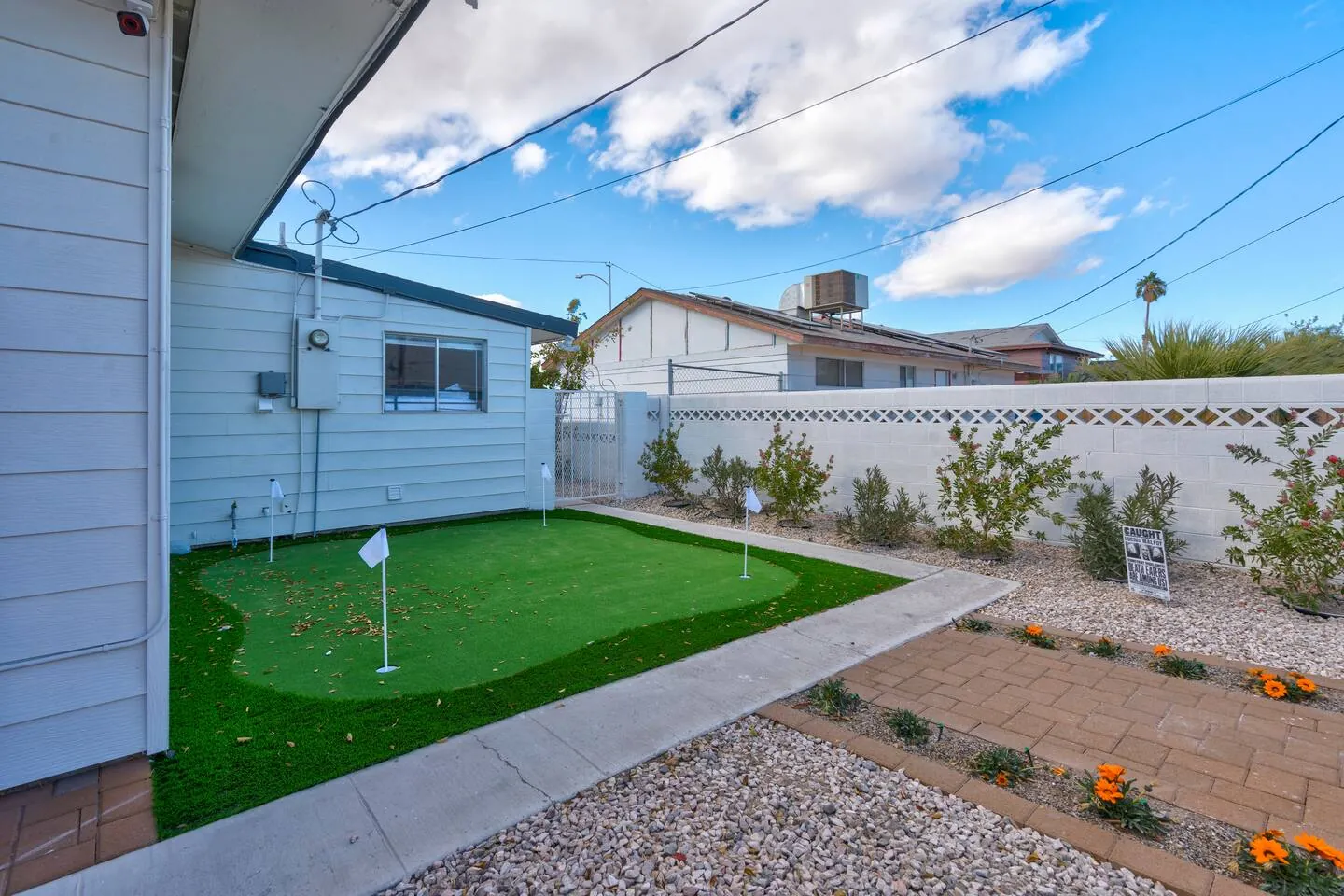 Putting green along the side yard, Wizard’s Dream in North Las Vegas