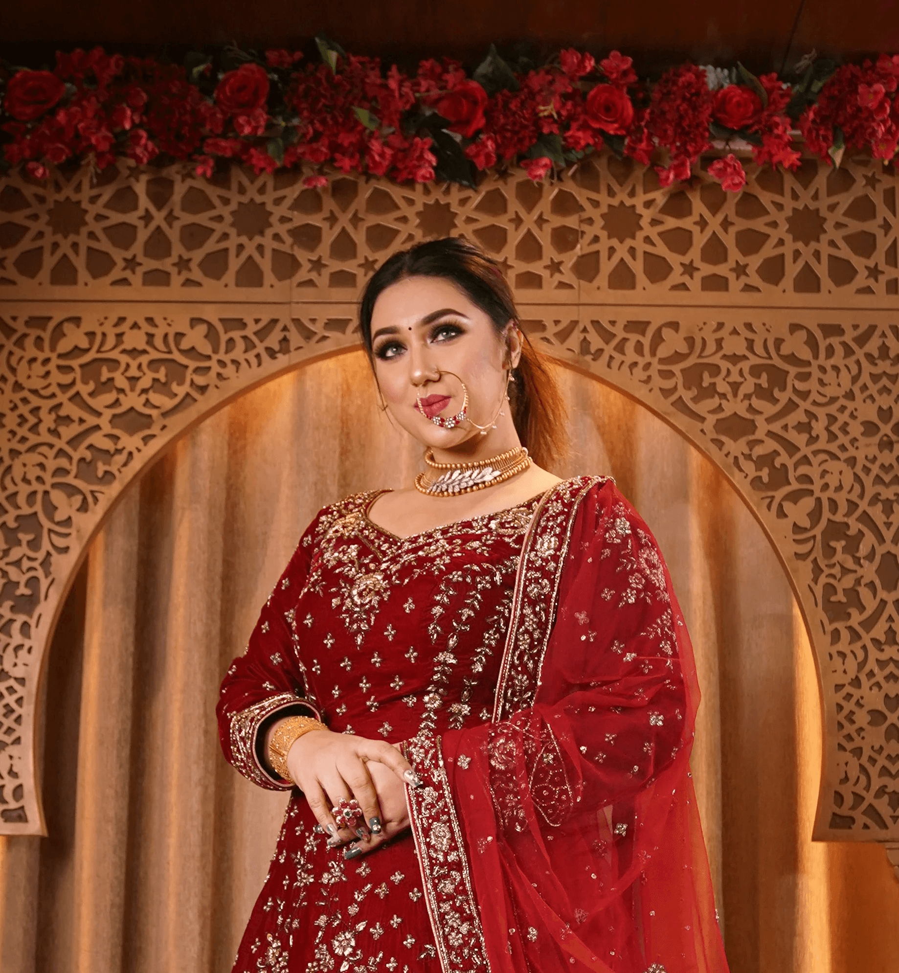 woman in red and white floral dress