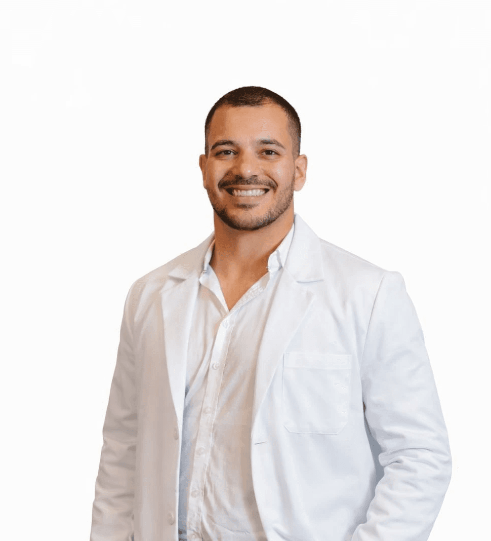 man in blue crew neck t-shirt smiling