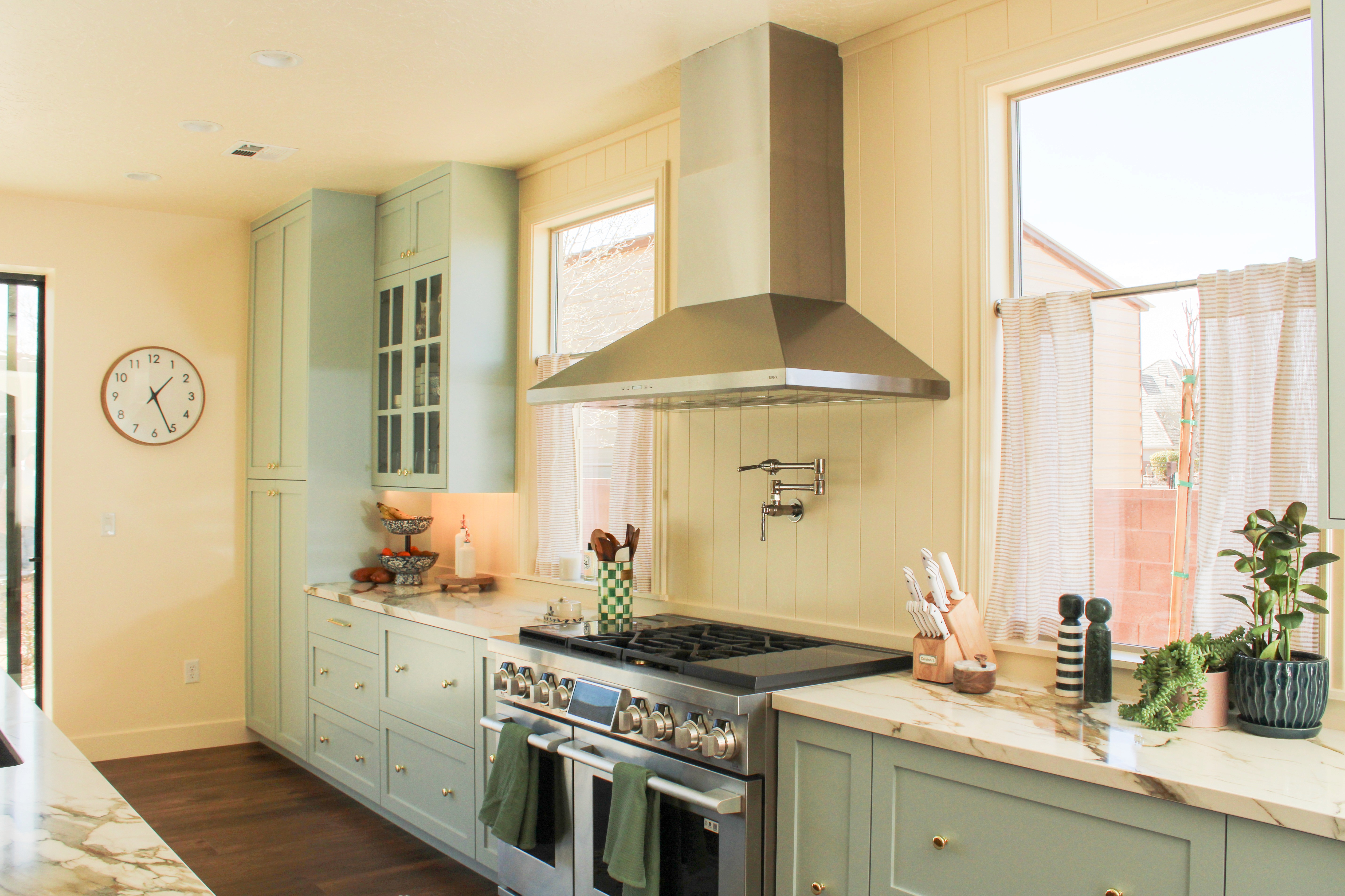 Expanded kitchen in a Washington, Utah home with pale blue cabinetry and upgraded appliances