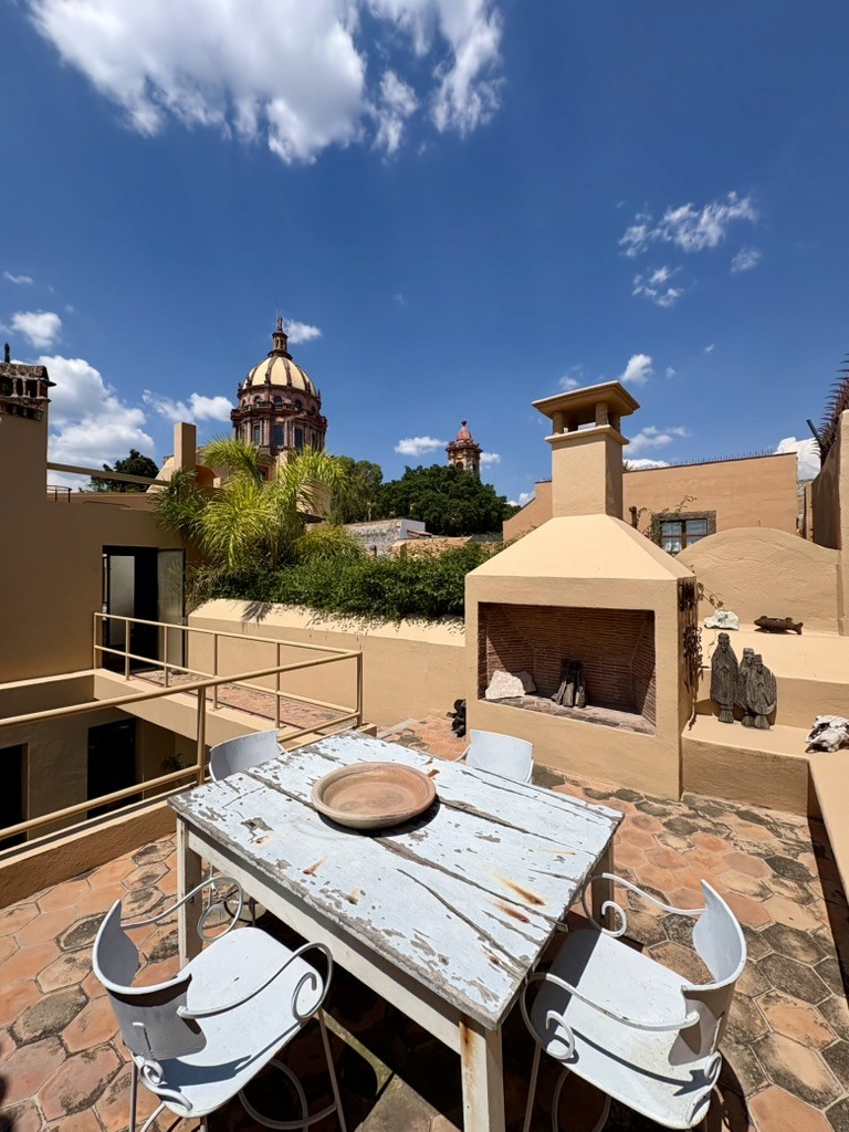 Rooftop terrace with church dome view at Casa de los Tíos