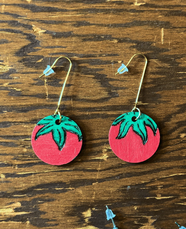Small wood burned tomato earrings.