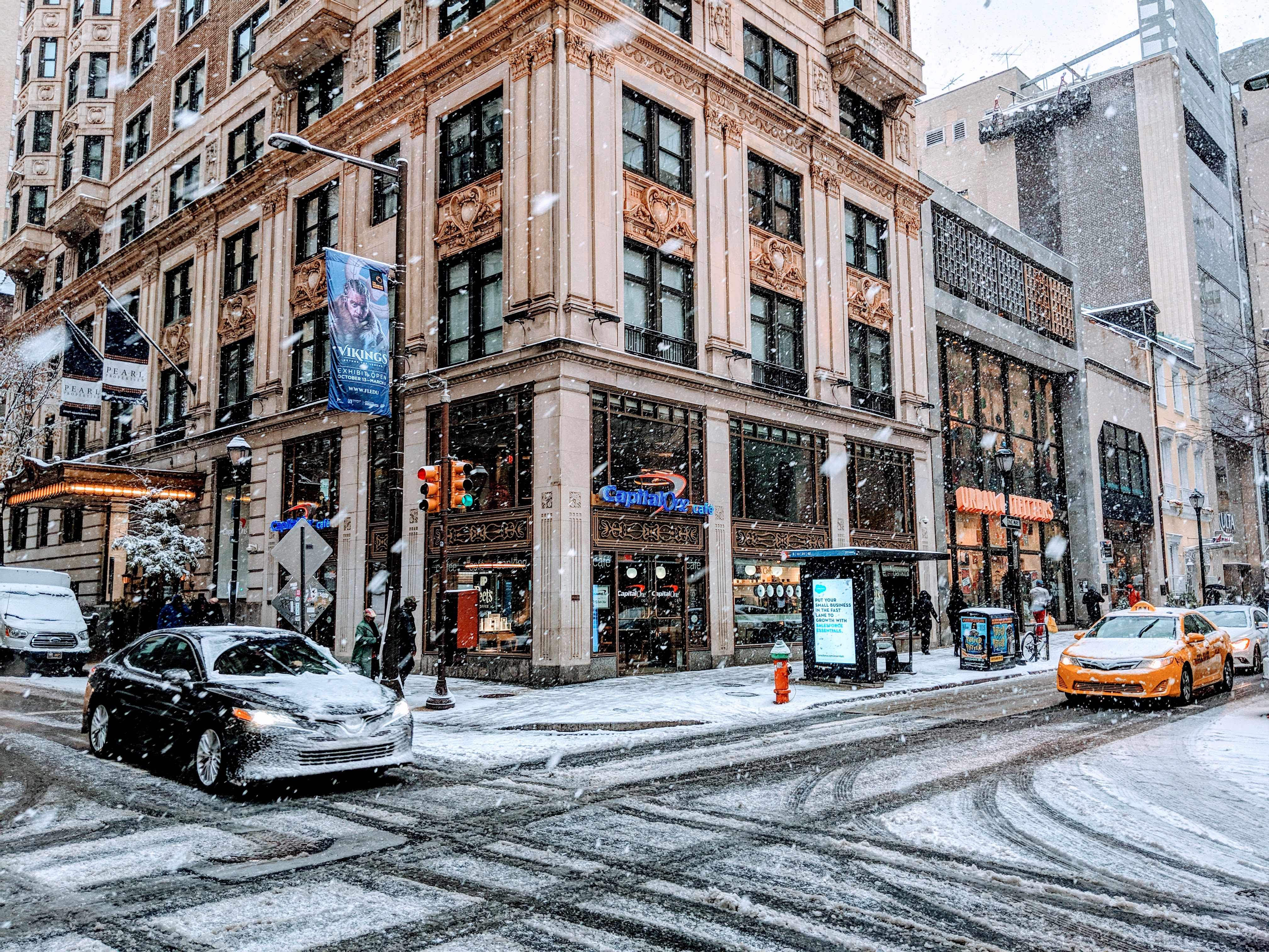 Picture of the front of the philly Capital One cafe location after a snow storm.