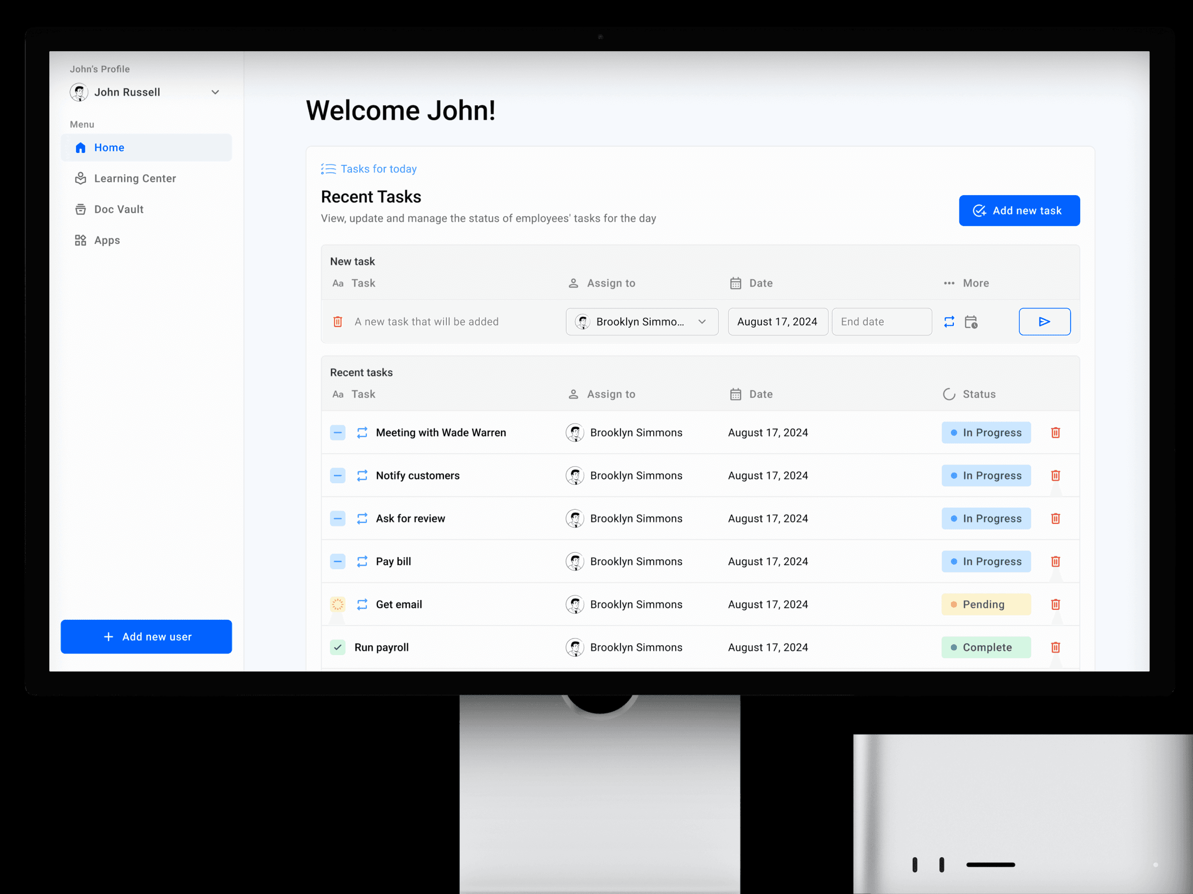 Экран компьютера, на котором отображается панель управления задачами с приветственным сообщением. Здесь представлены списки задач, ответственных лиц и статусов, таких как «В процессе» и «Завершено».