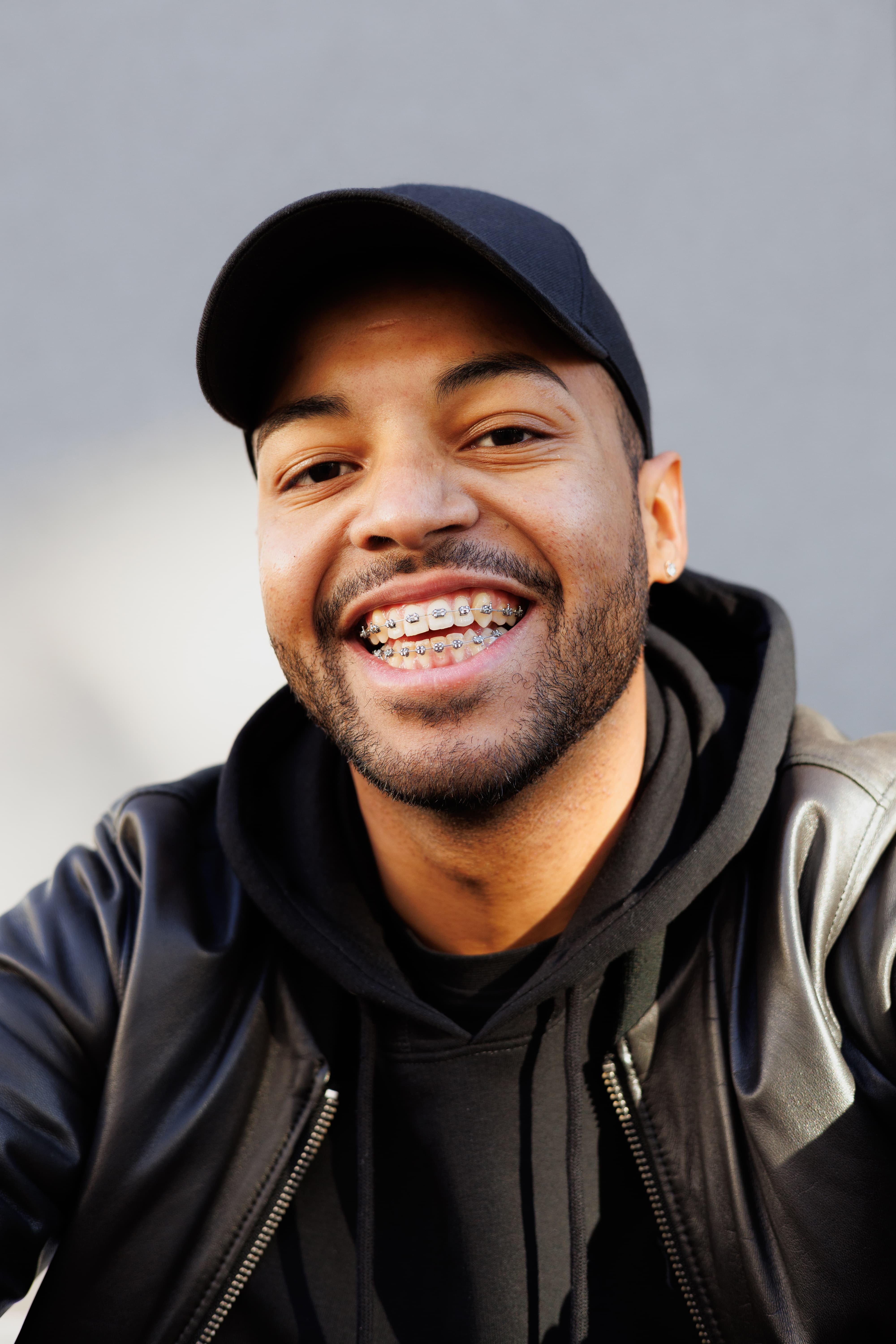 A young boy smiling with his braces