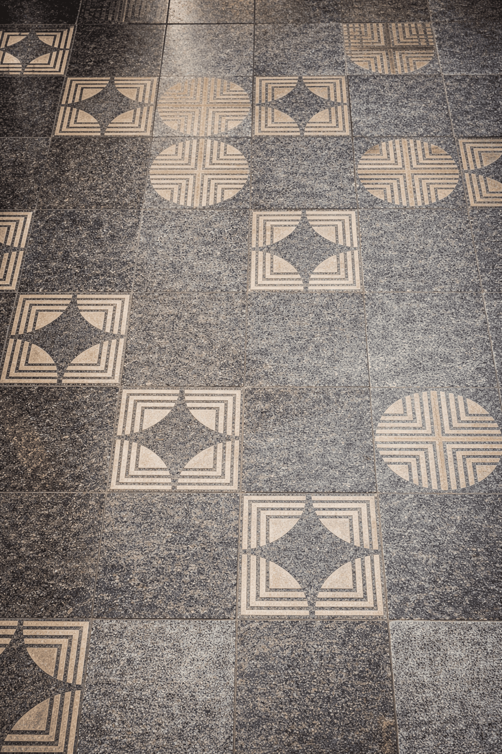 Close-up of decorative stone tile patterns used in residential outdoor flooring