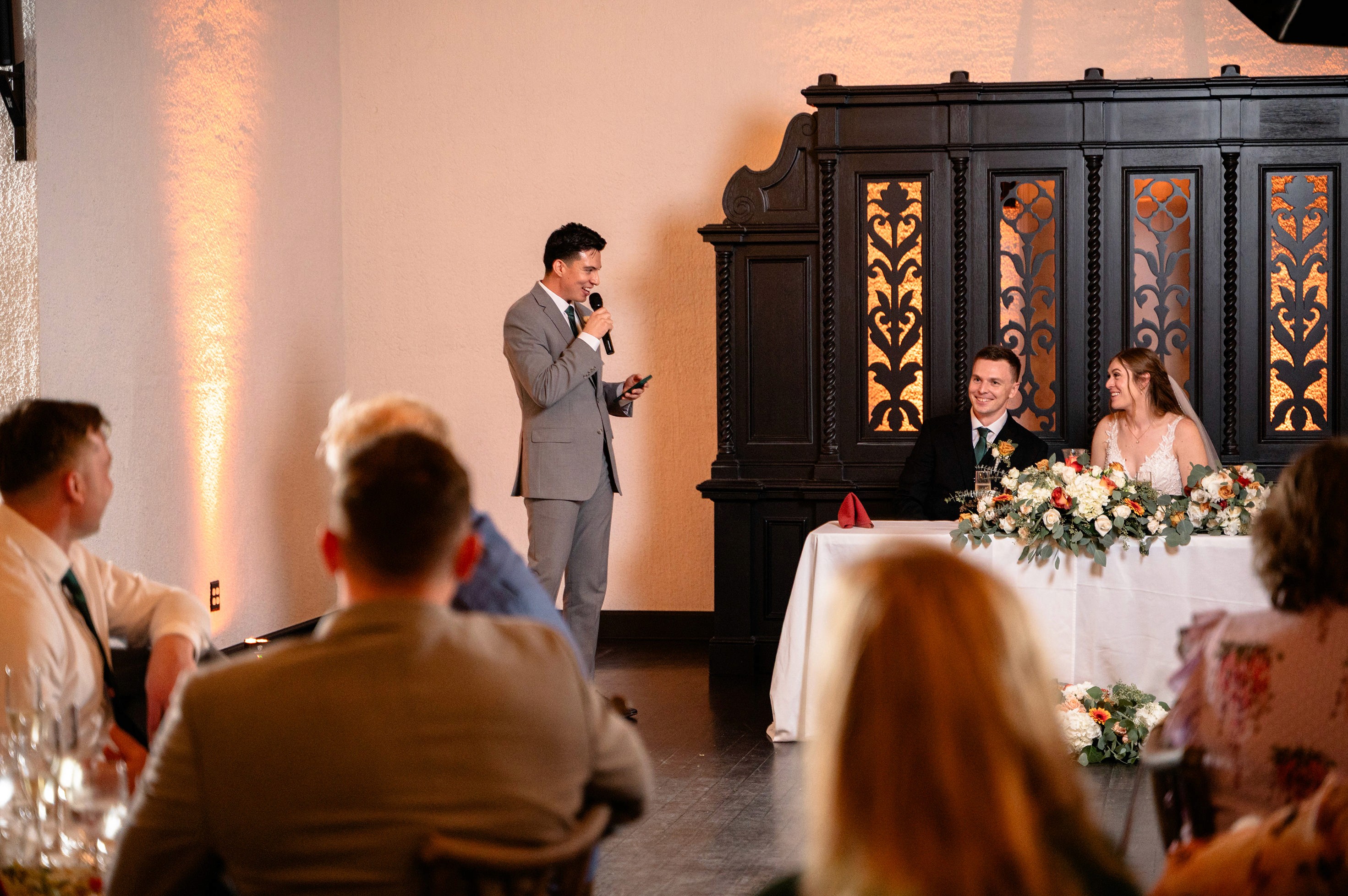 Flat lay wedding details with bouquet, rings, and sparkling bridal heels