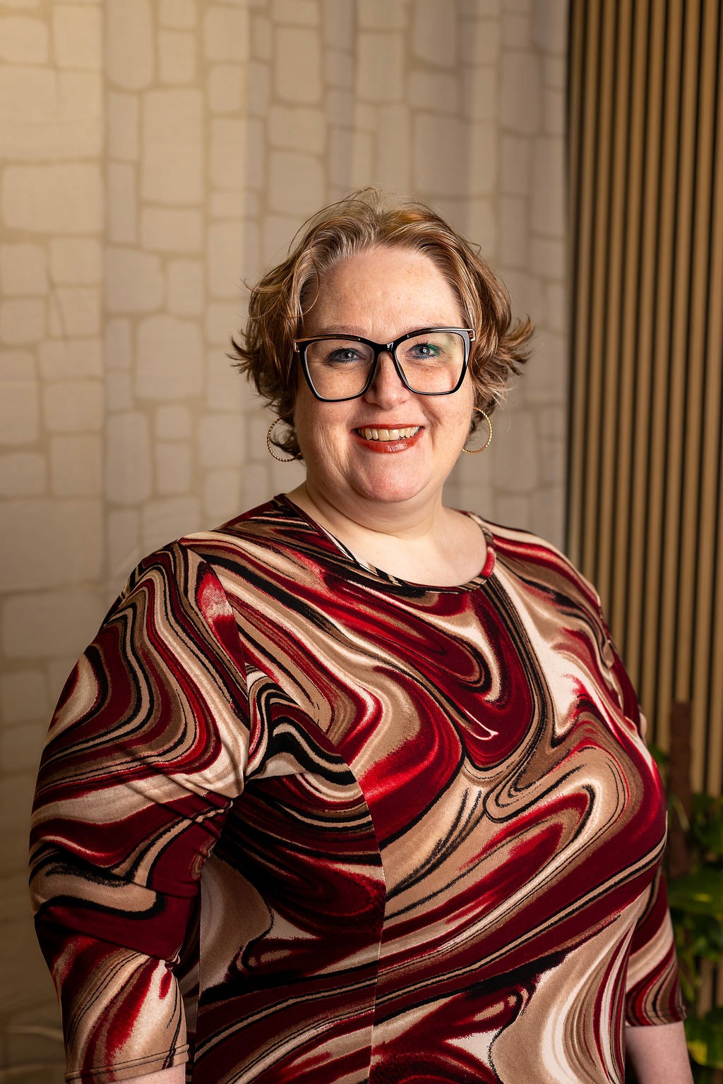 Female yoga instructor teaching a client