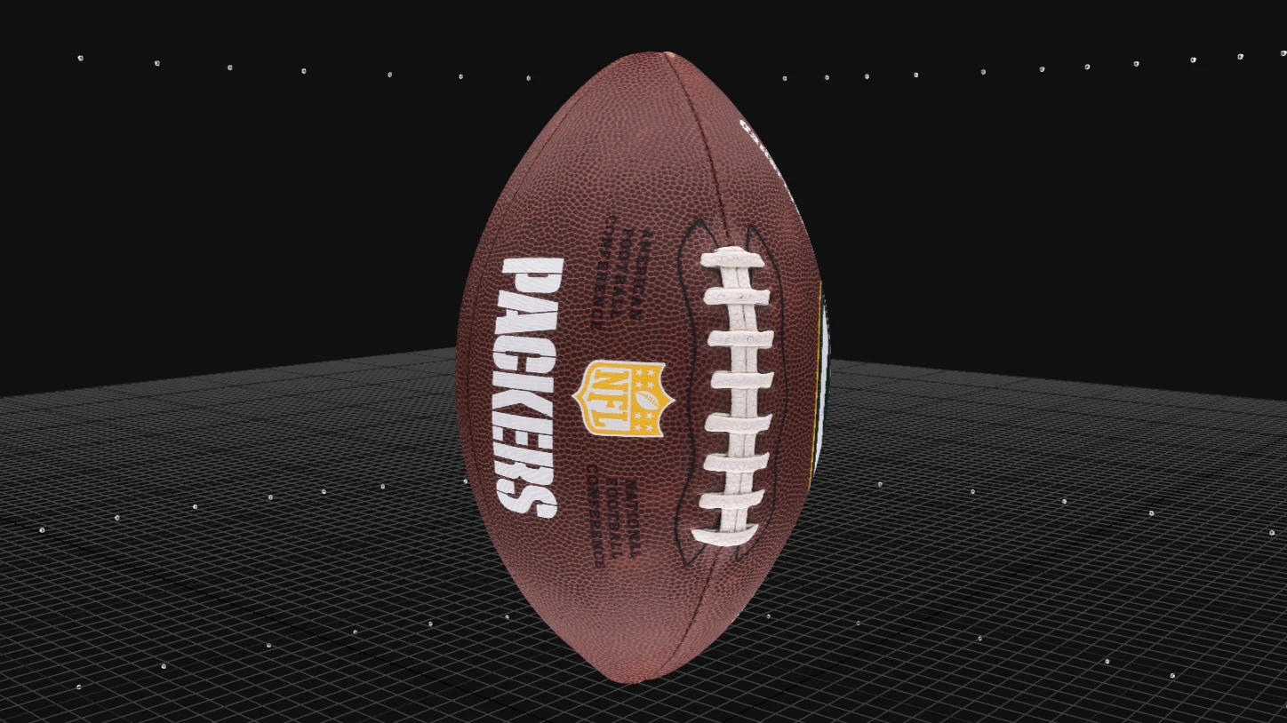 Textured 3D model of football with fine details visible.