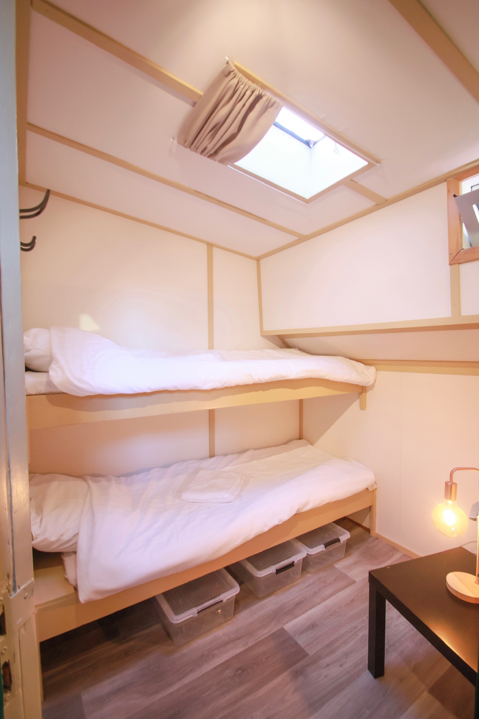 Modern office desk with angular design and leather chair