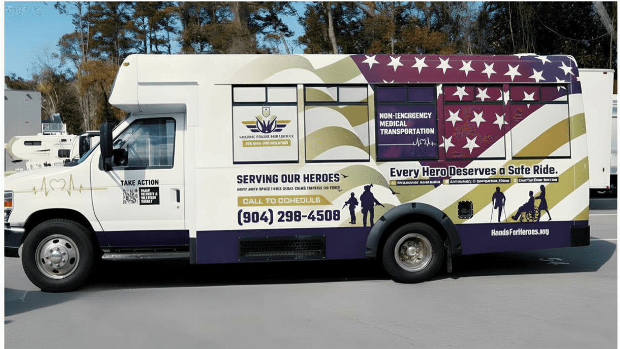 a black and white living room with a large tv