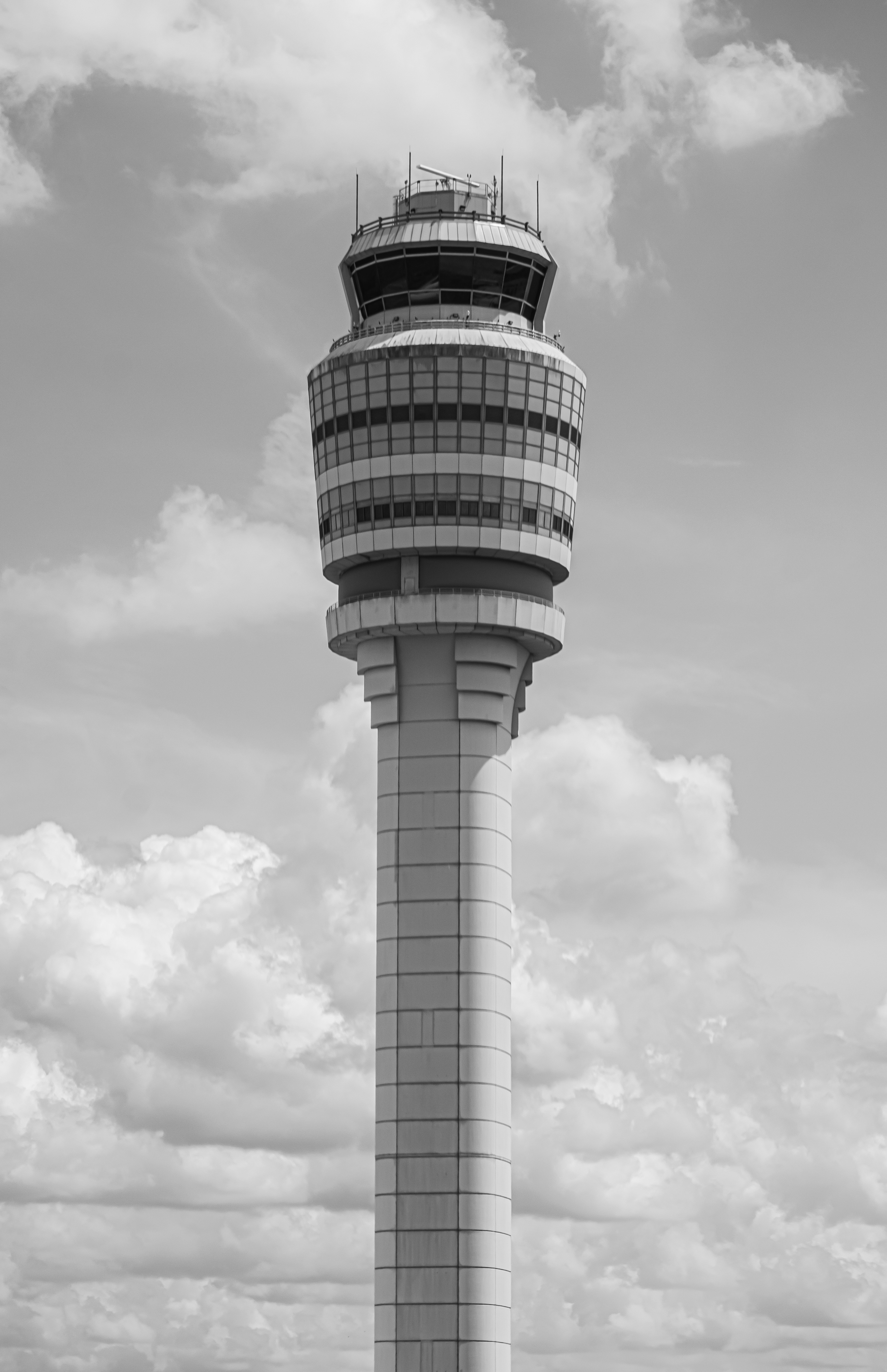 A tall air traffic control tower.