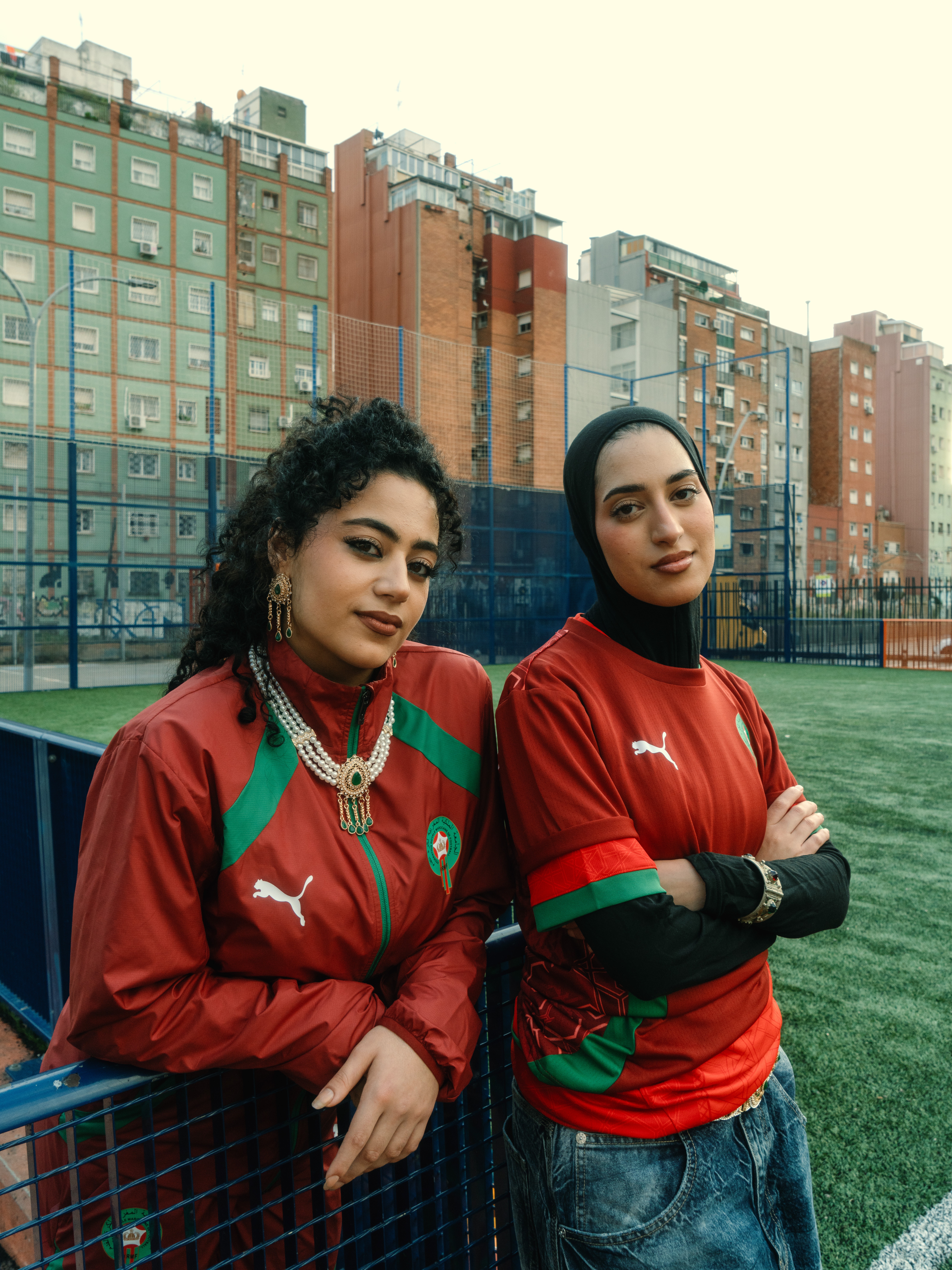 Streetside billboard with flyposters of the Batch.Works brand and illustrations