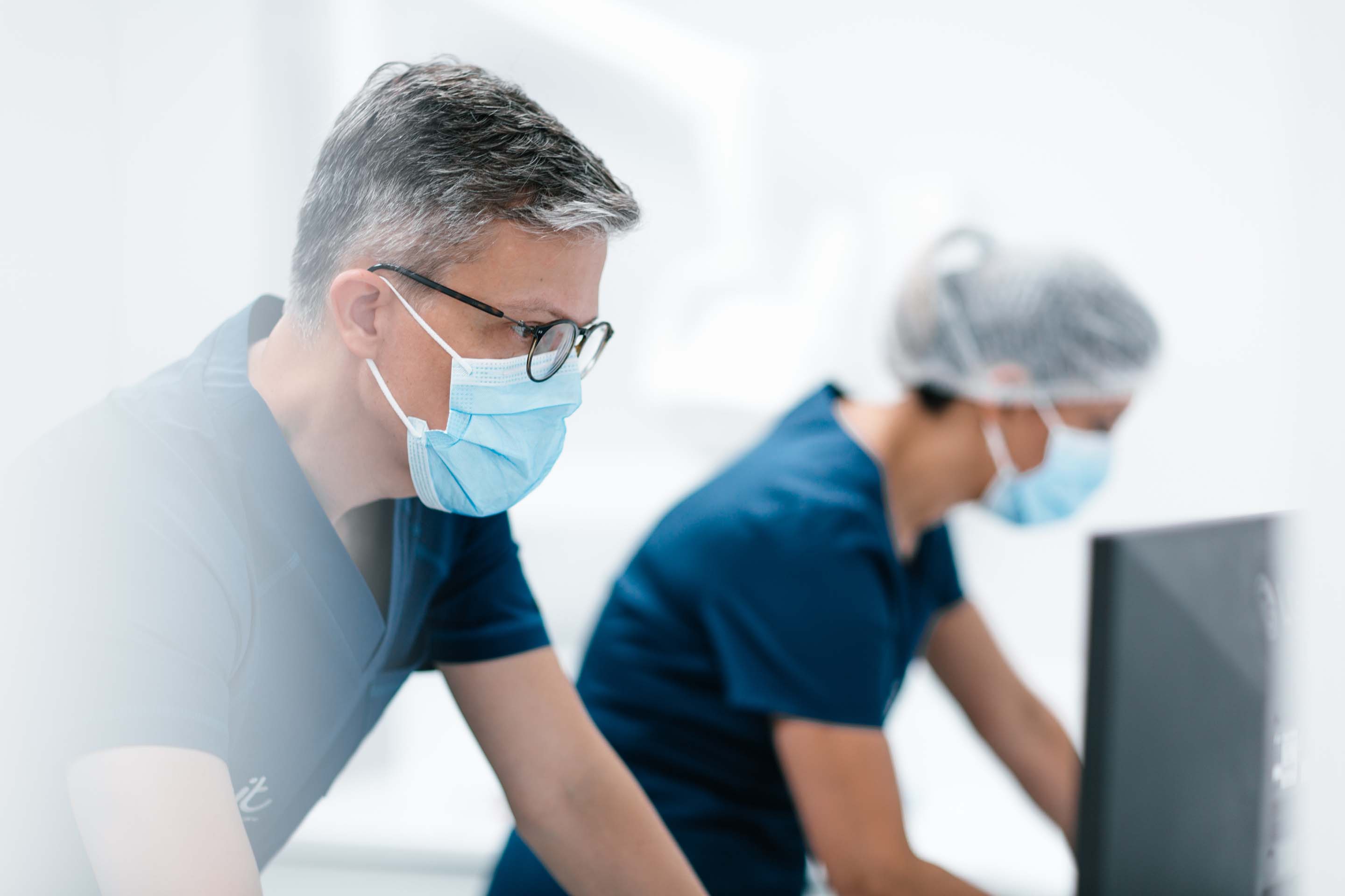 a close up of a woman's mouth with white teeth