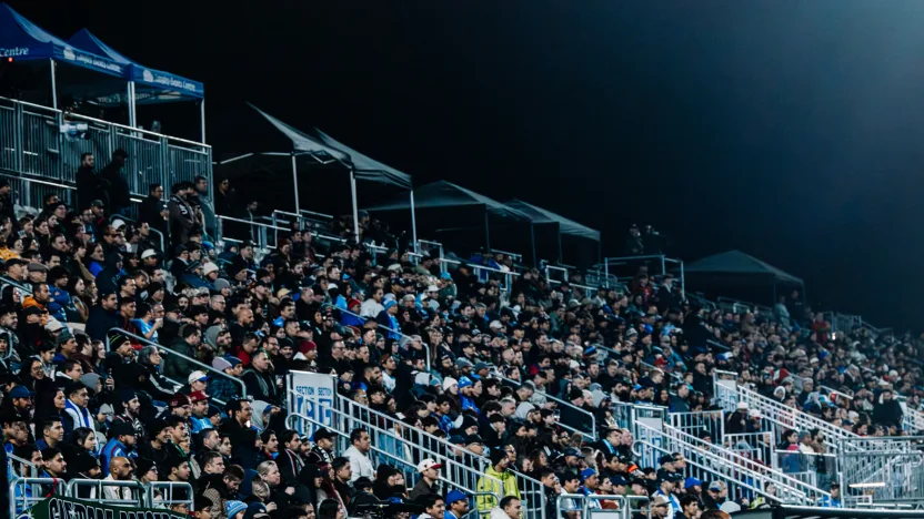 Supporters watching Vancouver FC at Willoughby Park Stadium