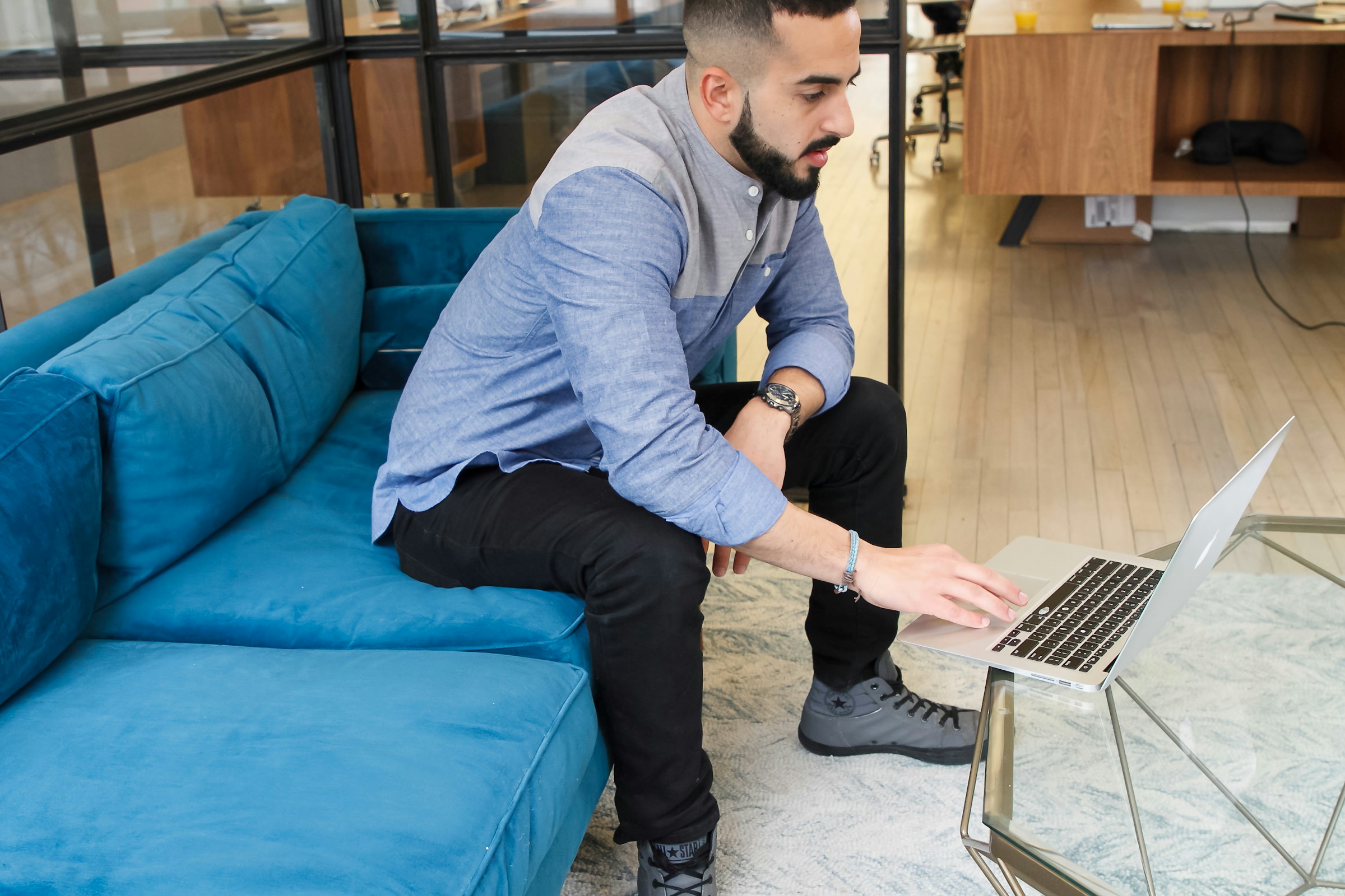 man with laptop in office - How To Get ChatGPT To Cite Sources