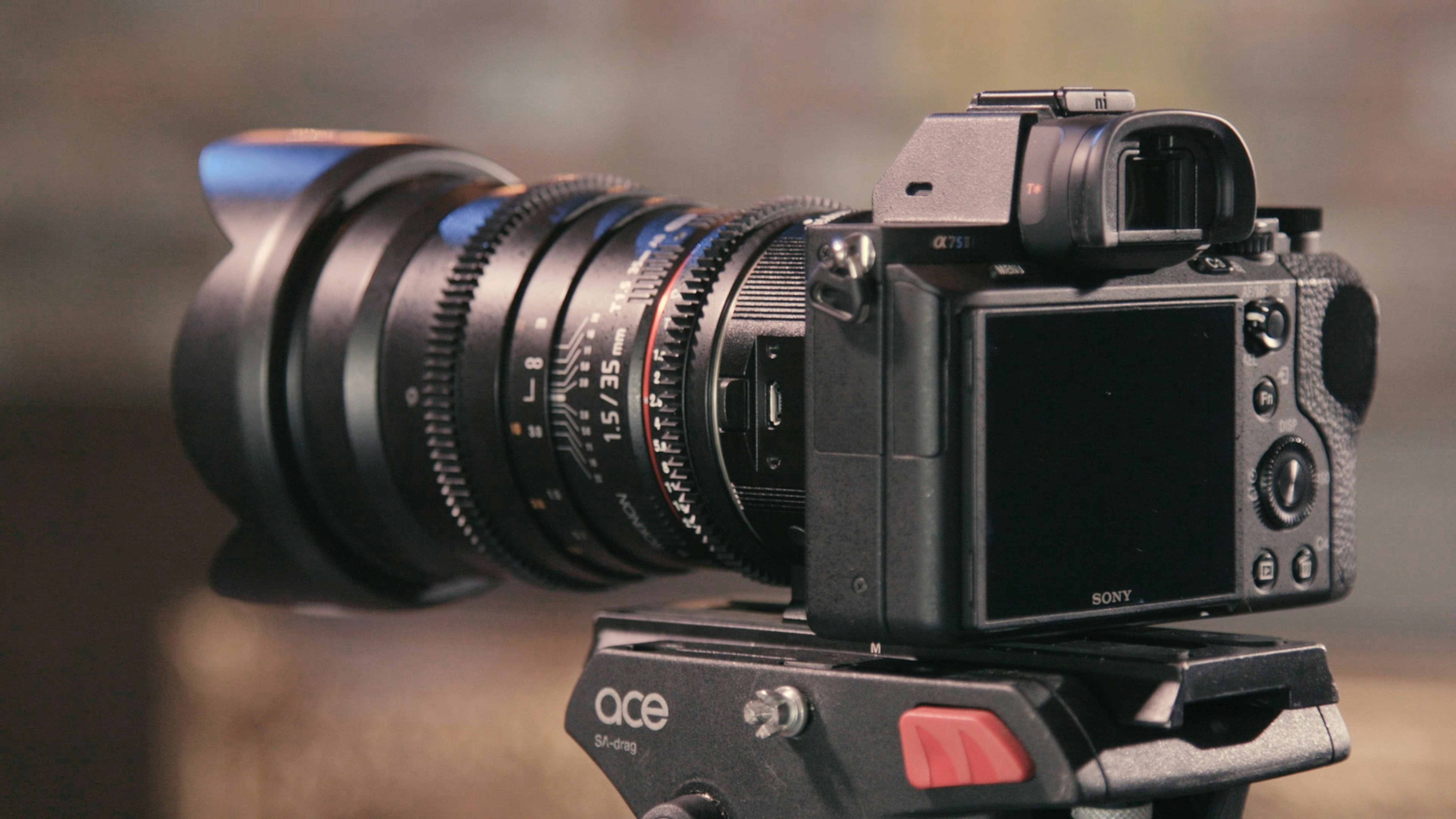 Mirrorless camera mounted on tripod with cinema lens for high-resolution video production
