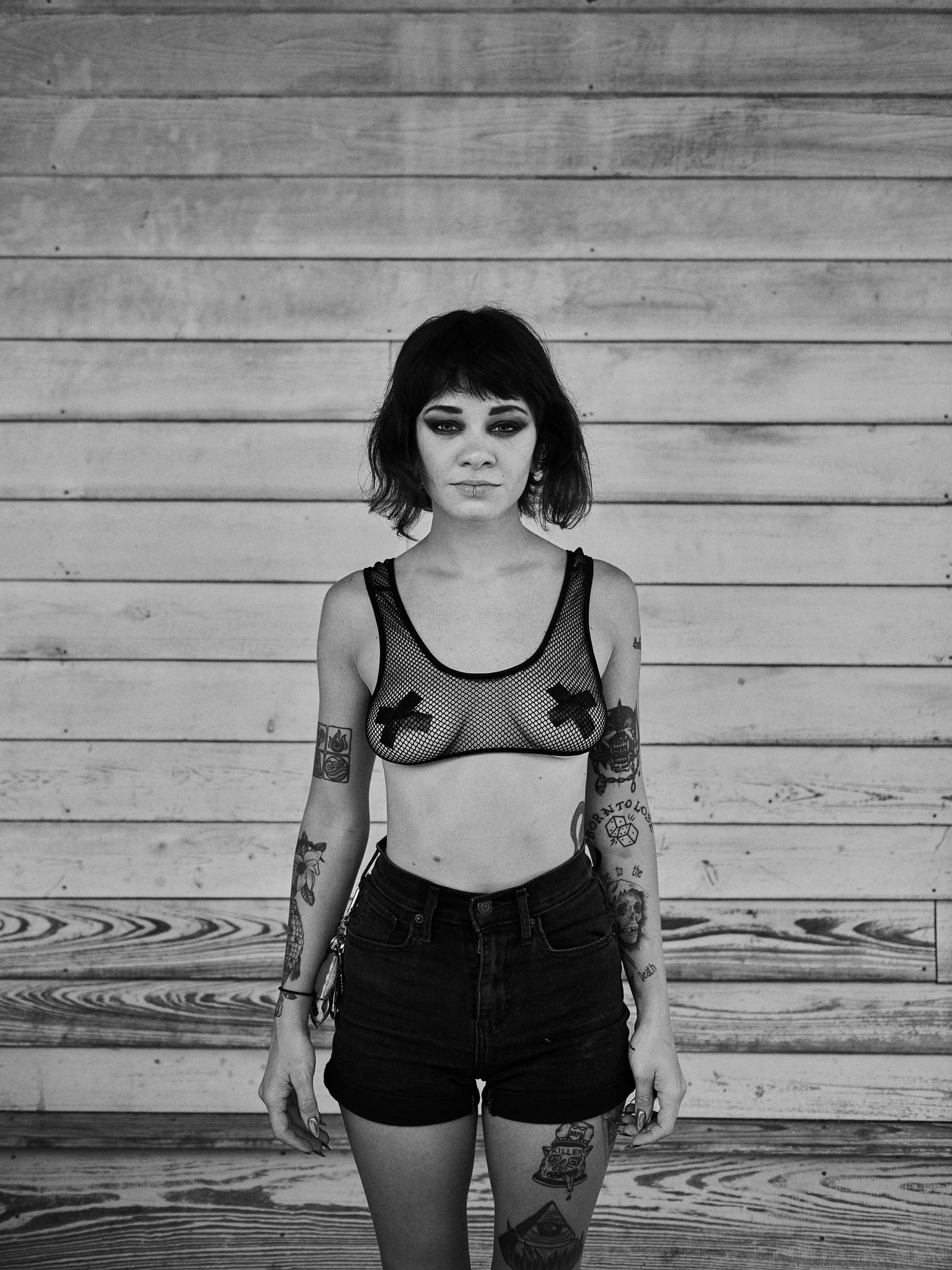 Black and white portraits of young alternative, romantic, goth, freak, punk and metal character against a textured New Orleans backdrop. 