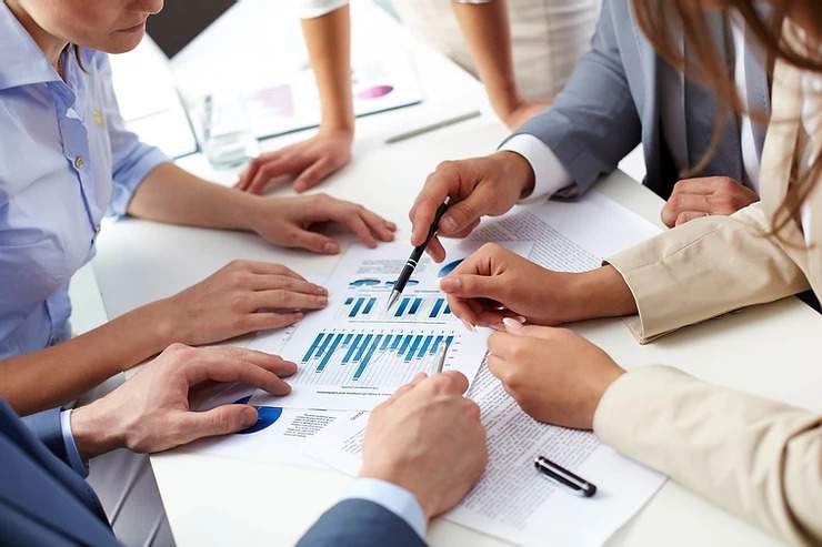 business team going overr analytics report