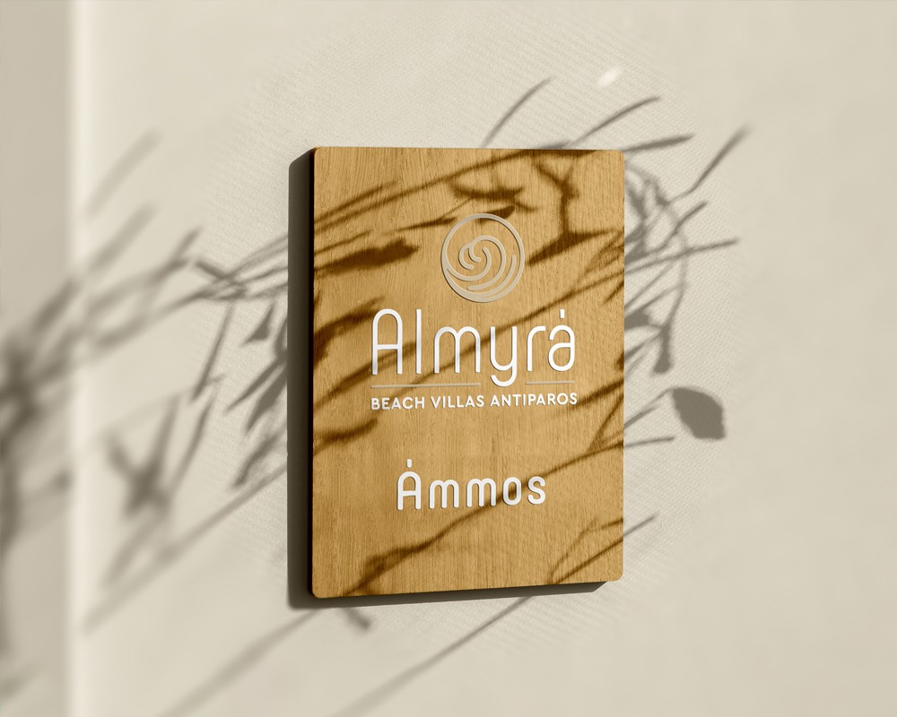 Branded wooden sign for Almyra Beach Villas Antiparos