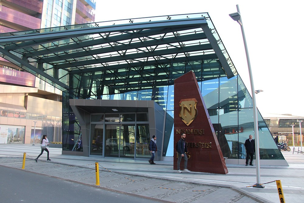 person writing on white paper